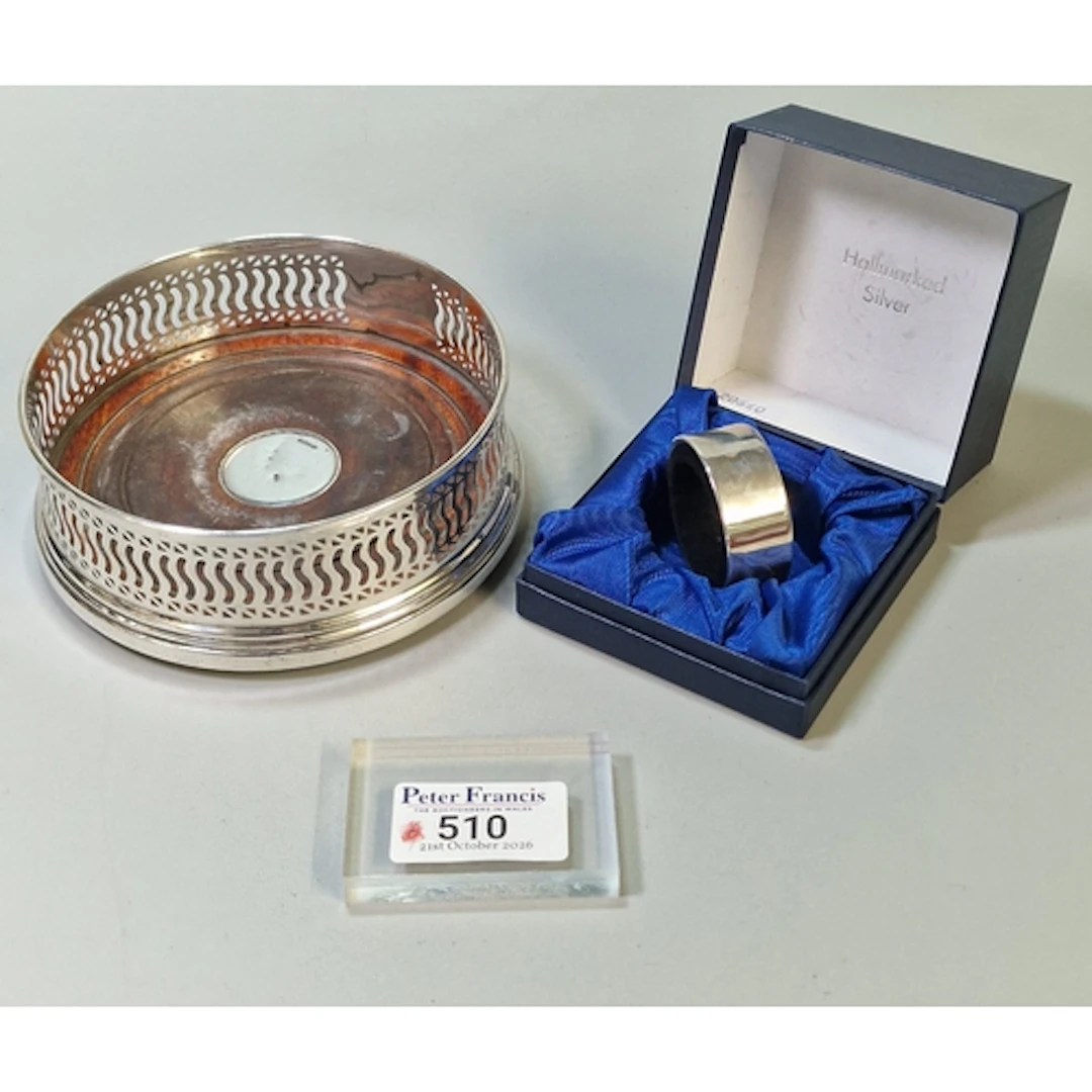 Queen Elizabeth II silver and pierced bottle coaster, by B &...