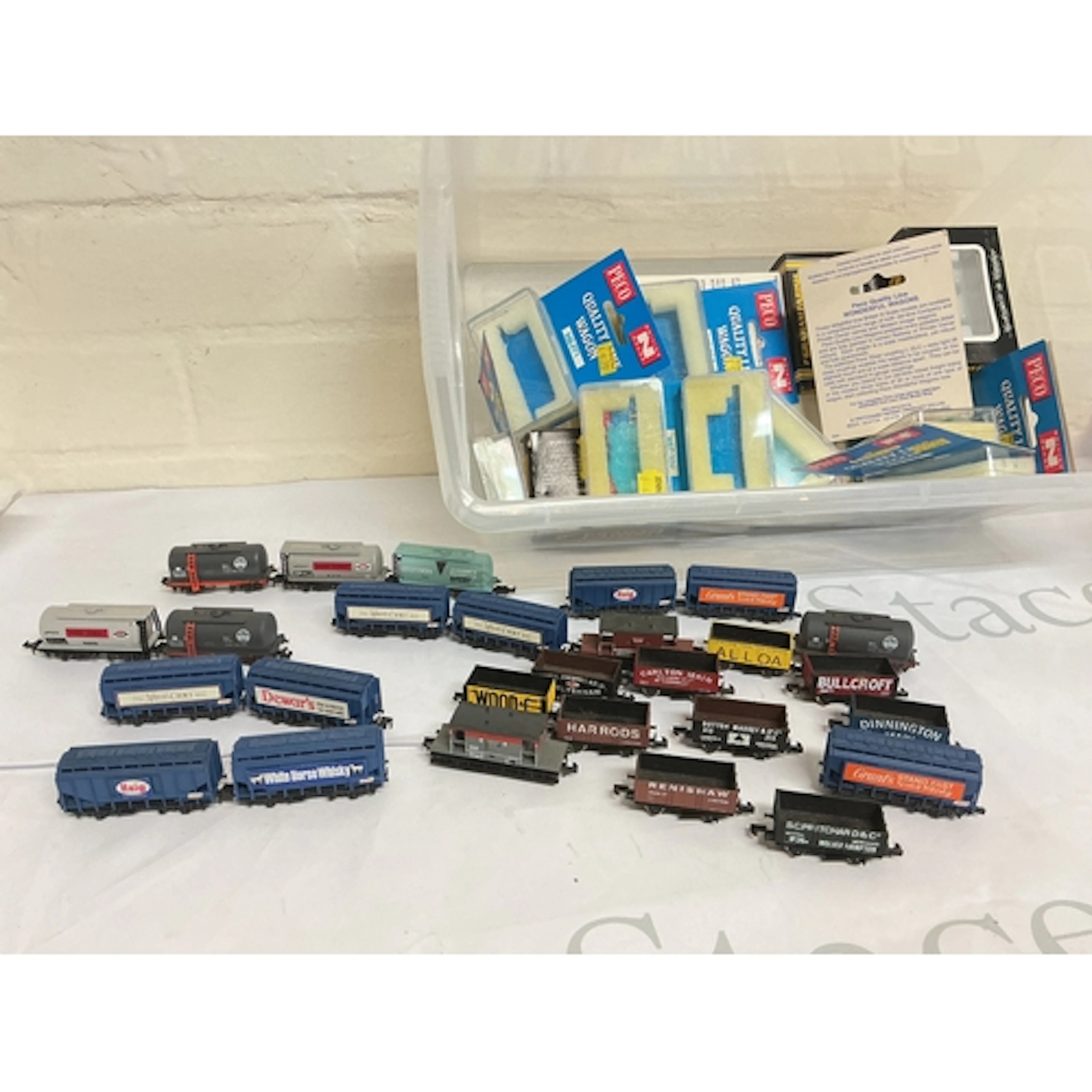 A Collection Of N Gauge Wagons (Some Glued Together) With Em...