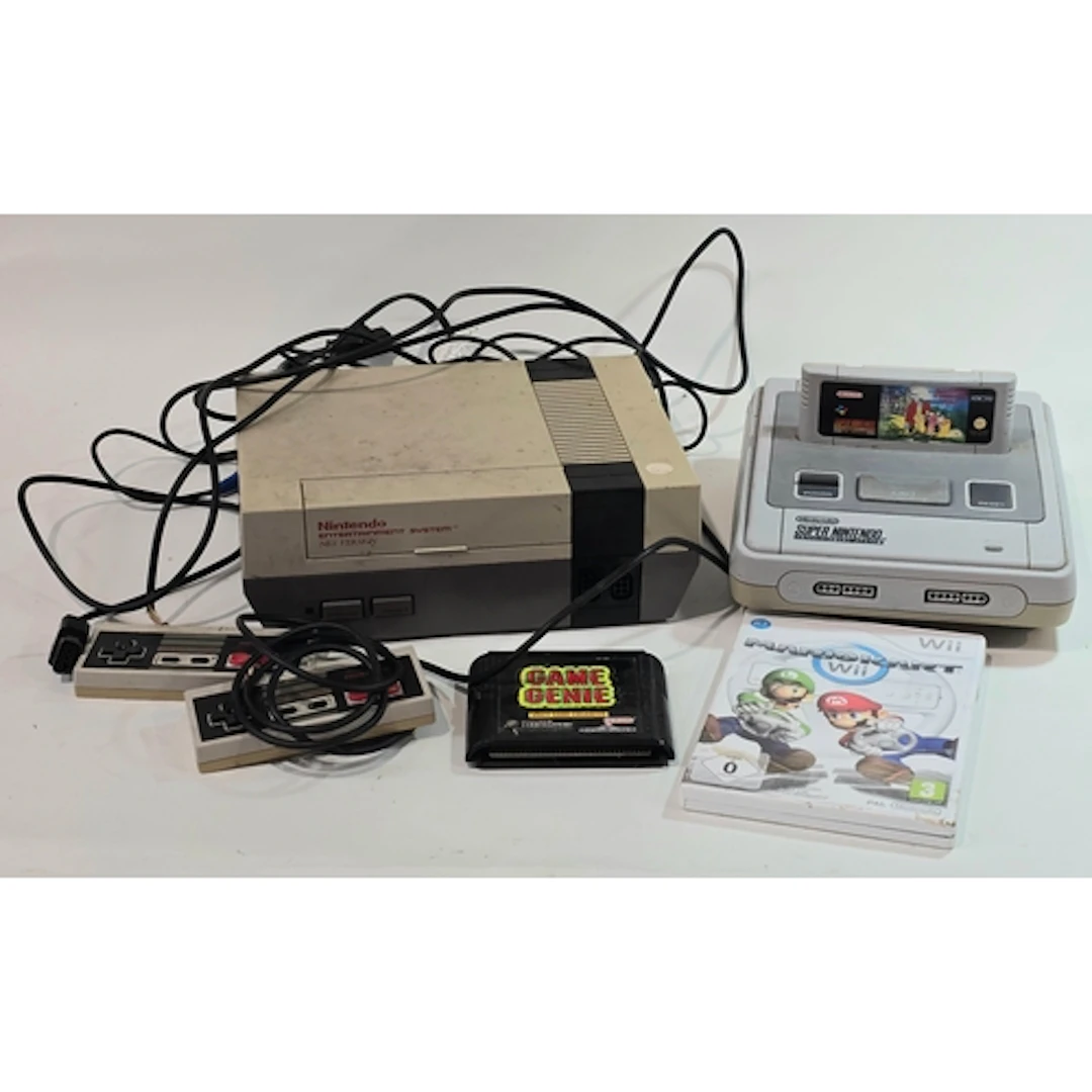 A vintage Nintendo Entertainment System (NES) together with ...