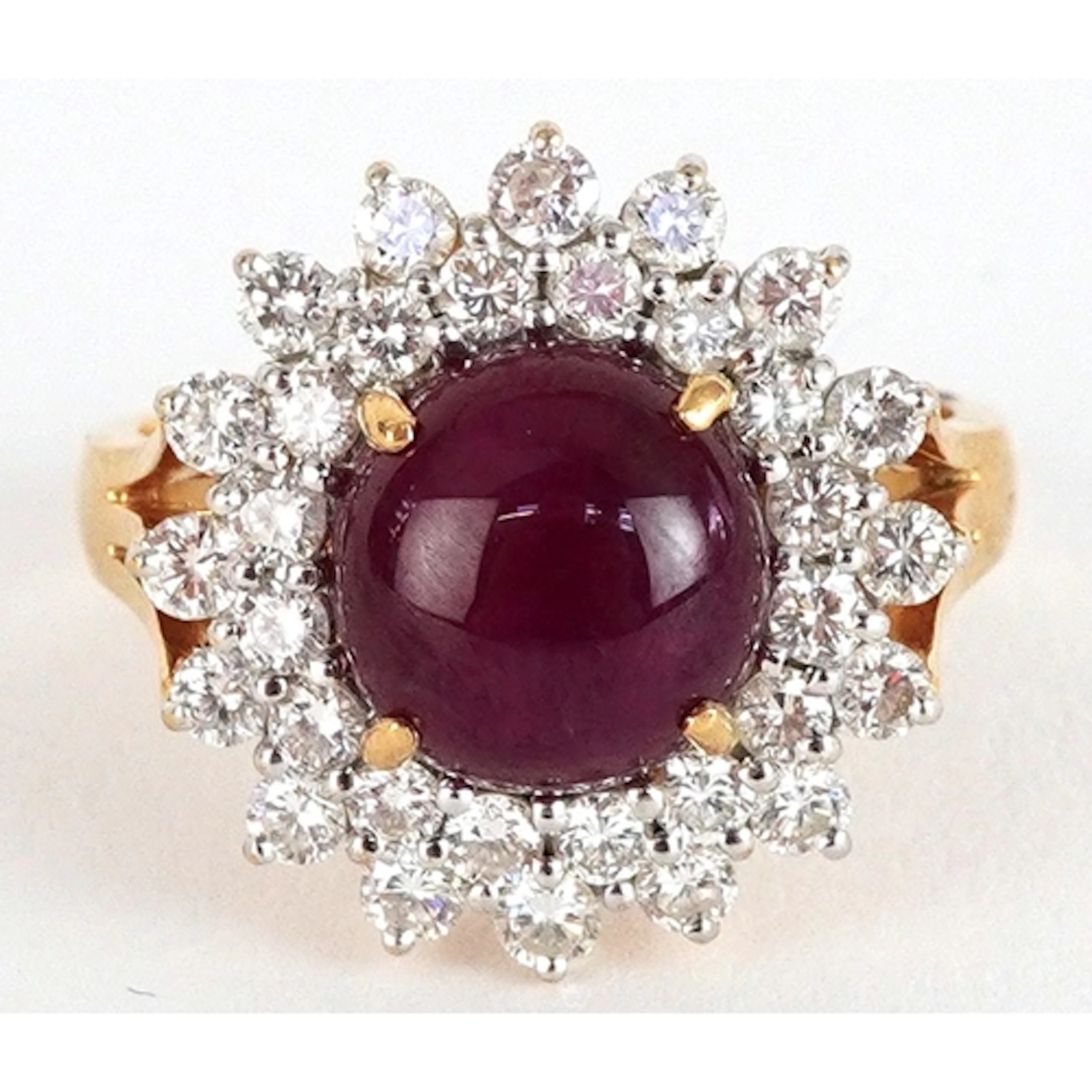 High carat gold cabochon ruby and diamond three tier cluster...