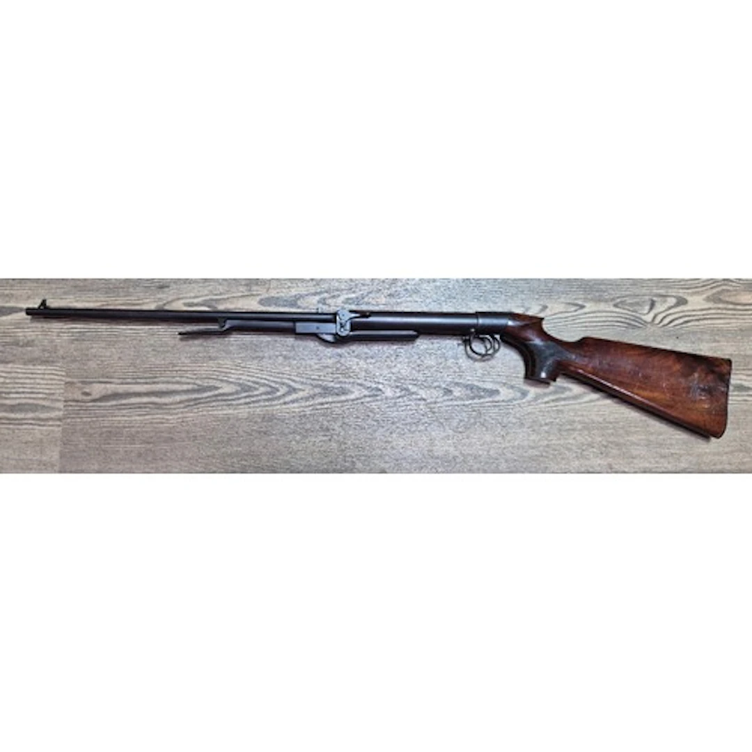 A vintage BSA under lever .177 calibre air rifle, 100cm long...