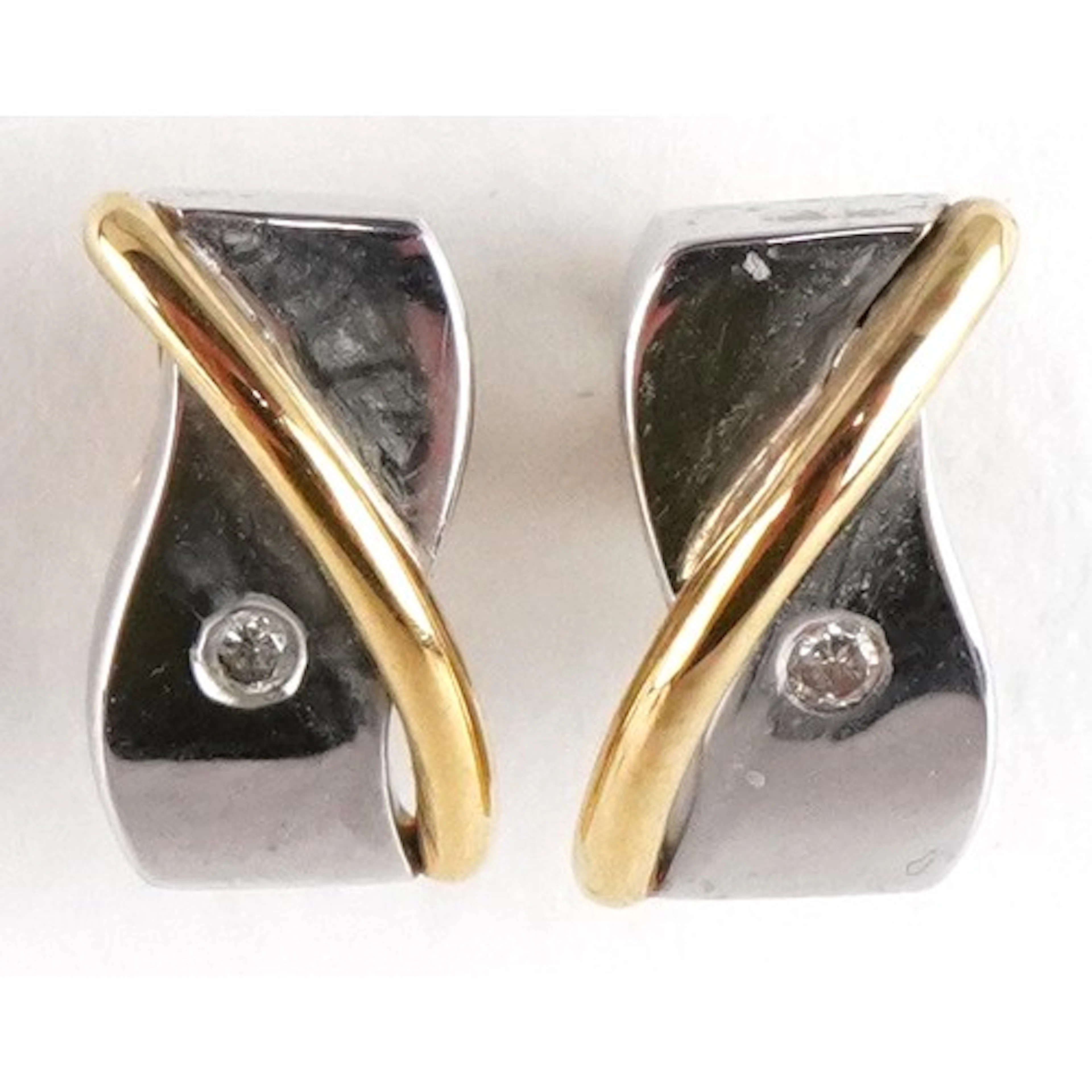 Pair of 9ct two tone gold diamond stud earrings, 1.0cm high,...