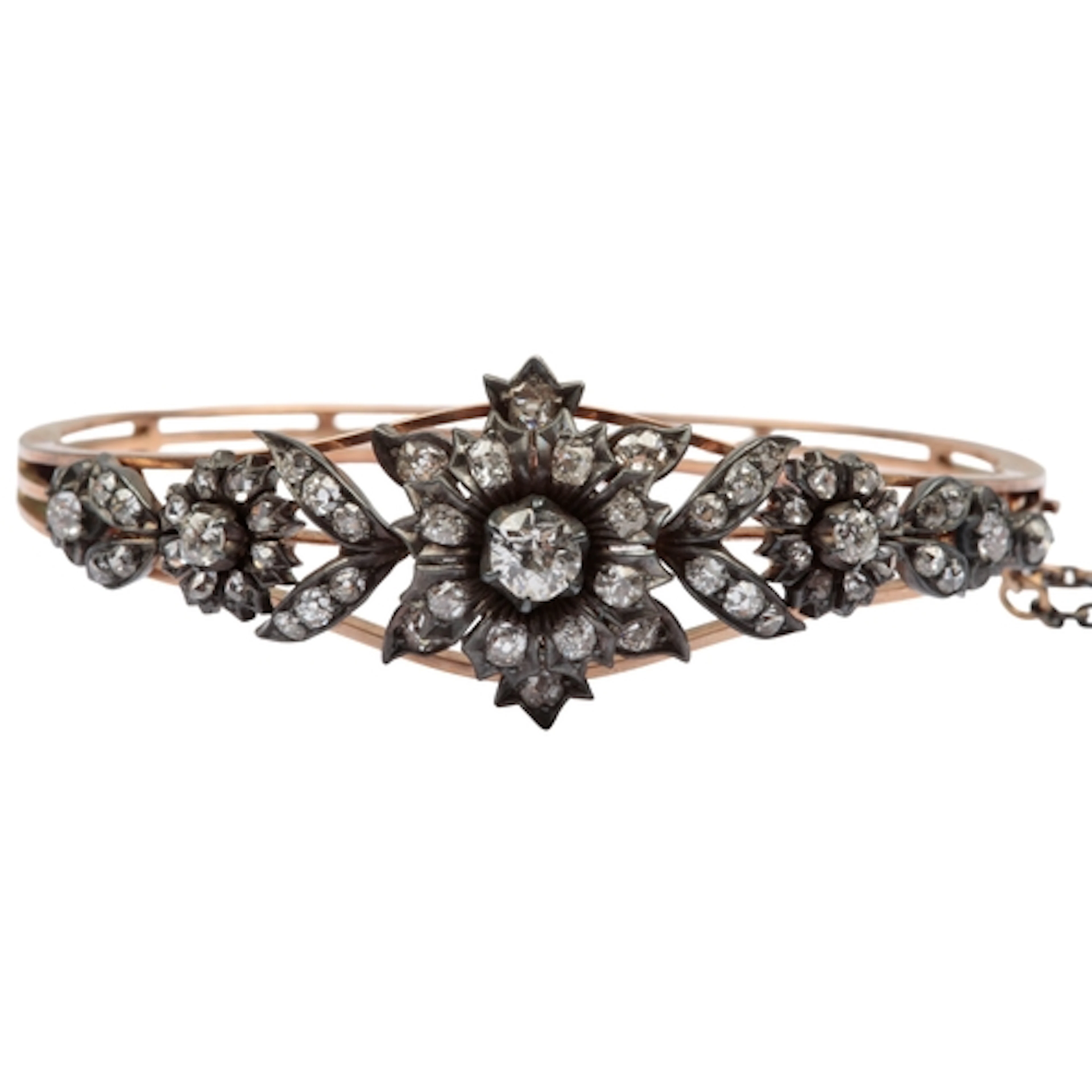 A Victorian diamond bangle, late 19th century, the hinged go...