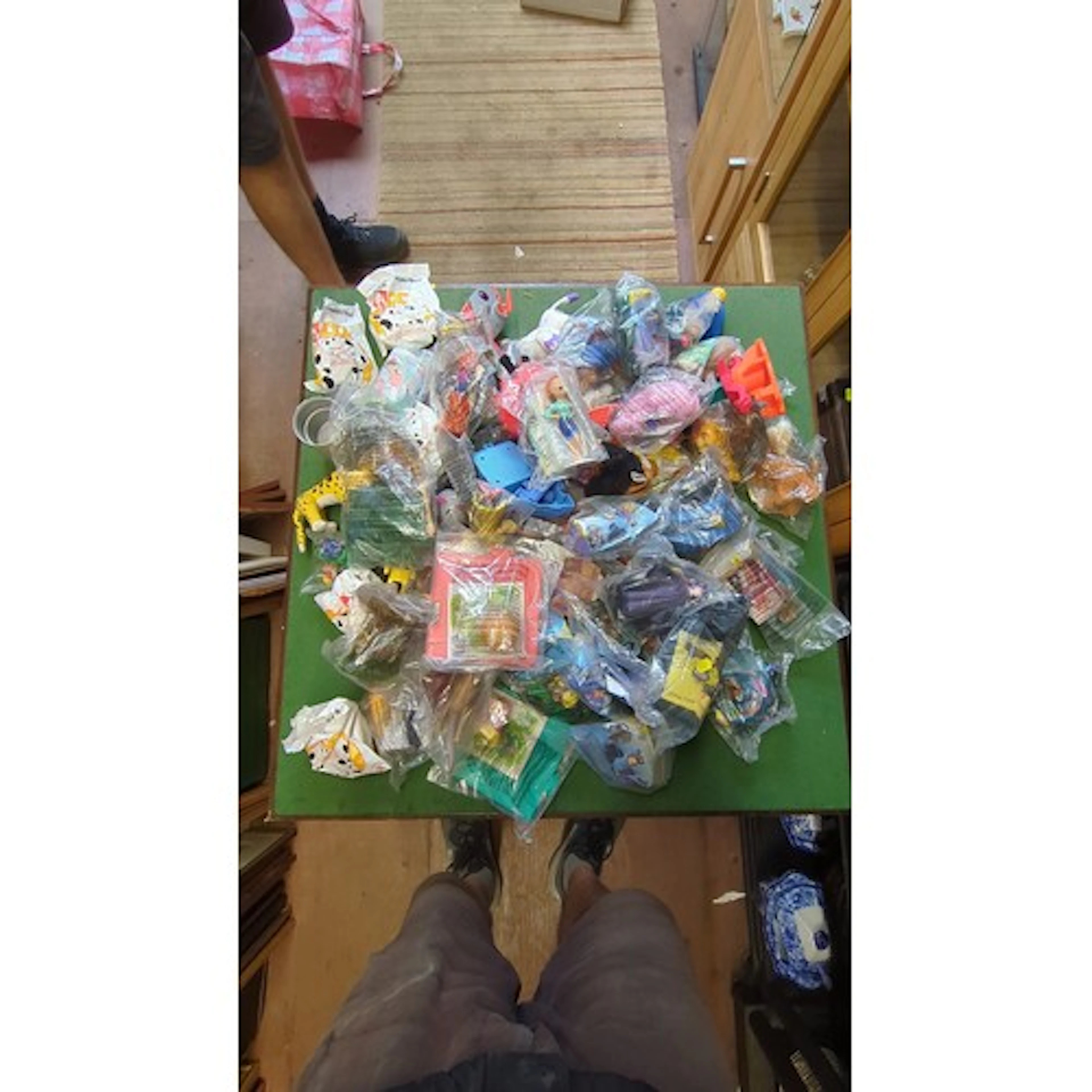 A quantity of McDonald’s Happy Meal toys, various plastic fi...