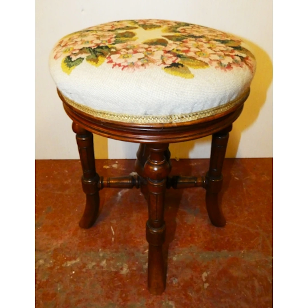 Victorian mahogany piano stool with revolving floral tapestr...