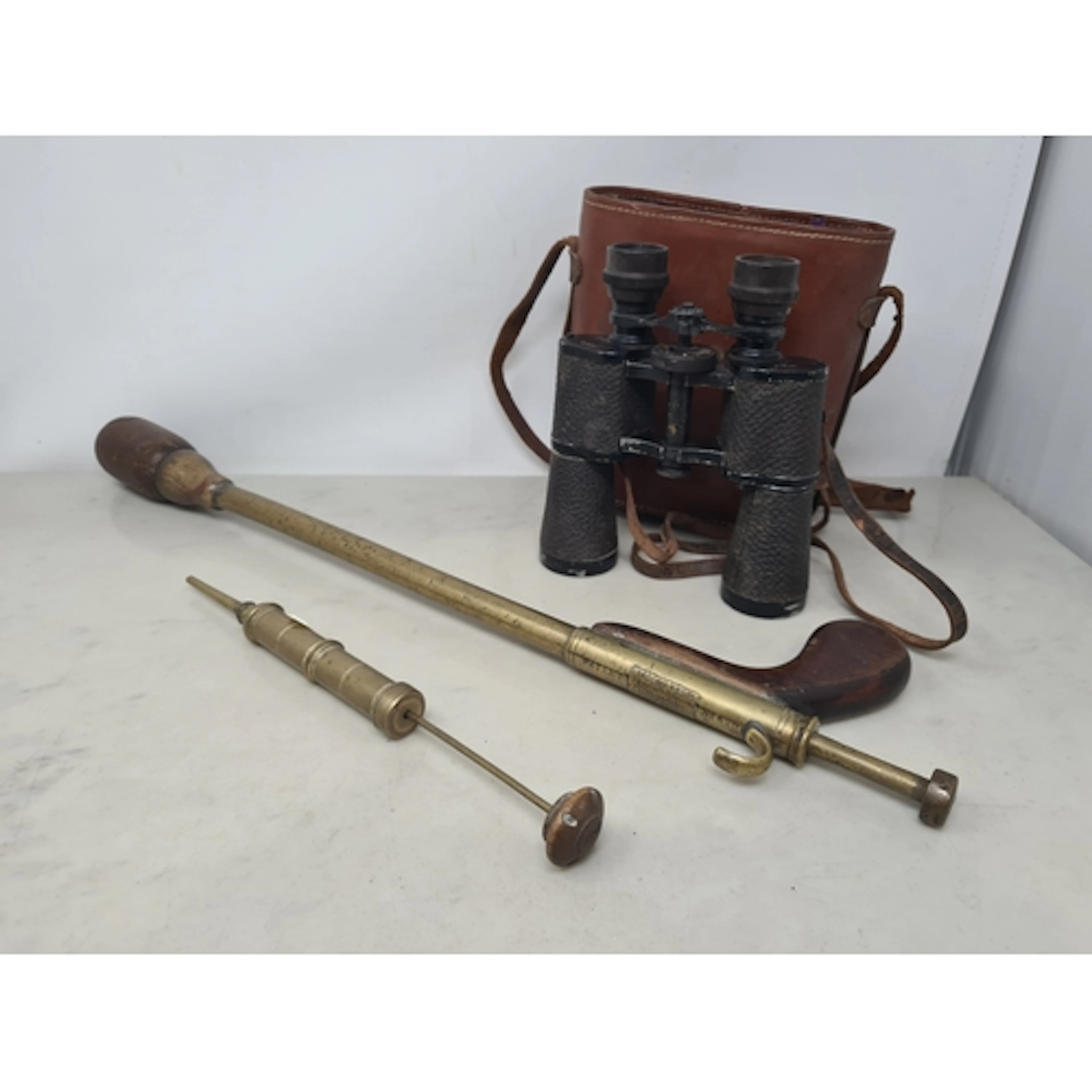 A brass patent Pill Dispenser with wooden pistol grip, by Ar...