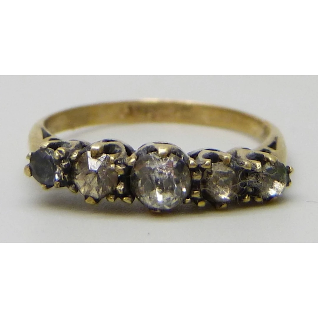 A yellow metal ring set with paste stones, a/f, 1.4g, K/L (m...