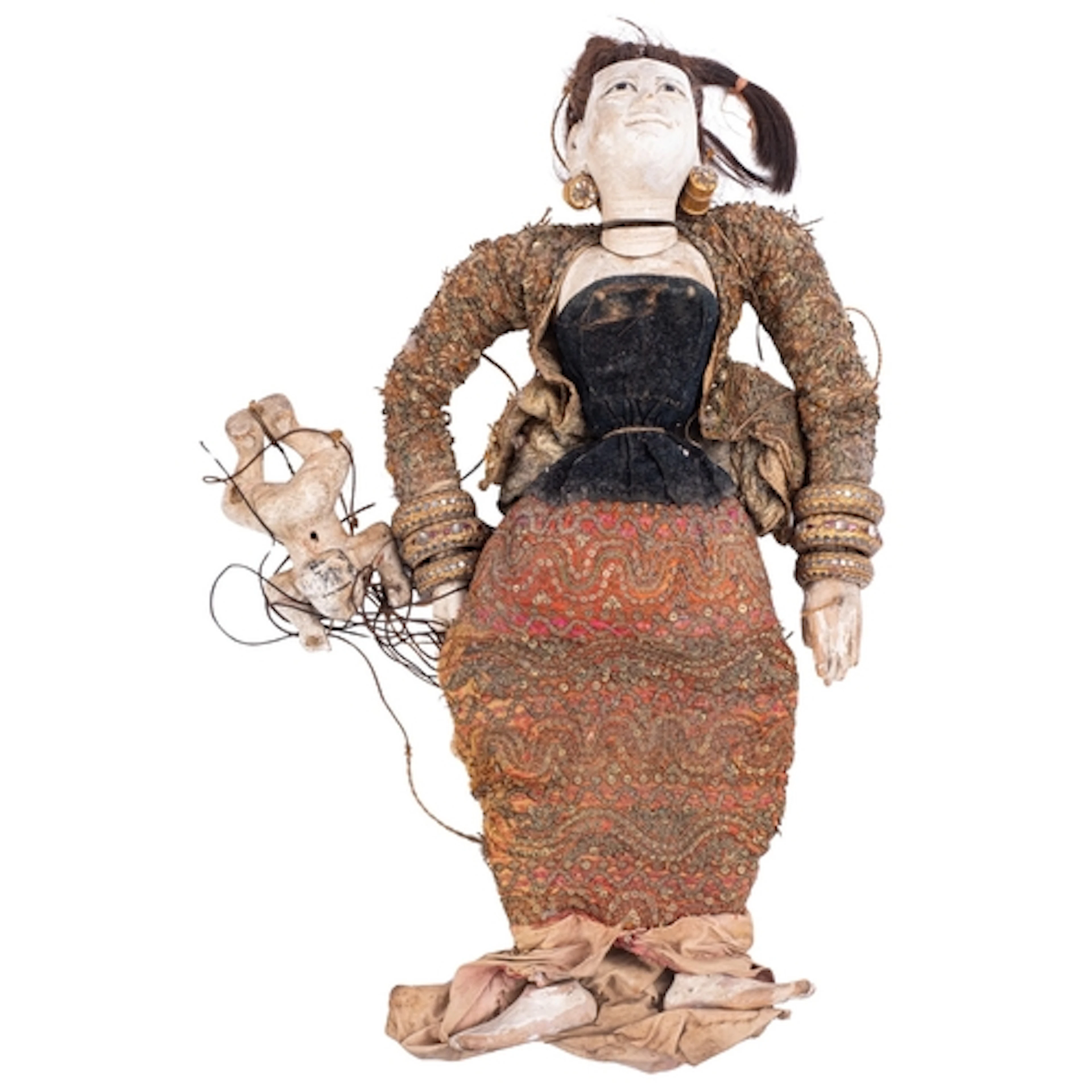 A South East Asian painted wooden puppet modelled as a minth...