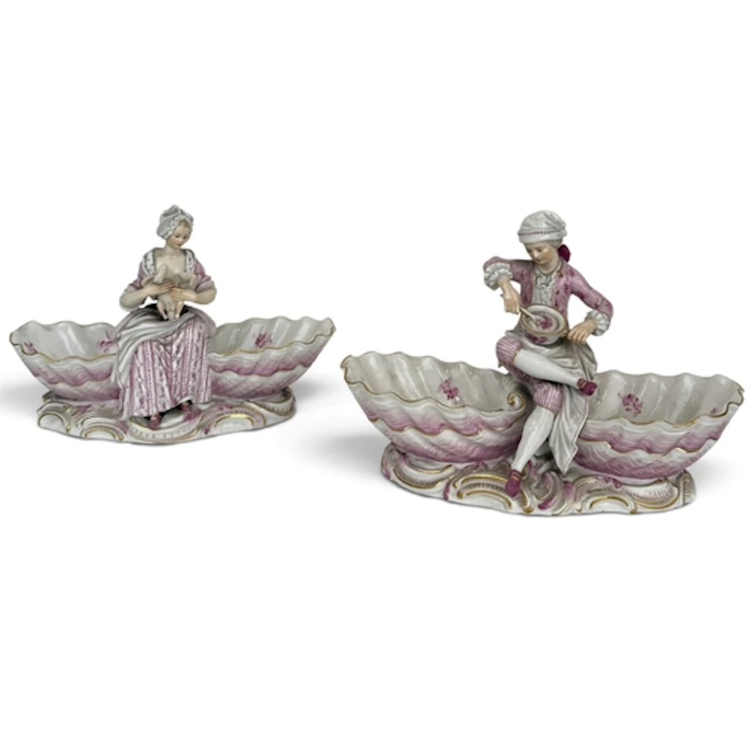 A PAIR OF MEISSEN PORCELAIN FIGURAL SWEETMEAT DISHES Each wi...
