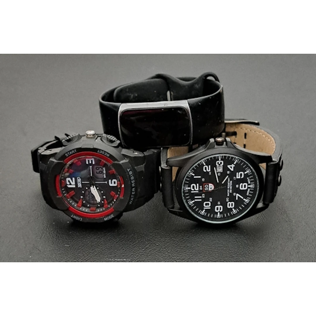 TWO GENTS WRISTWATCHES AND A FITNESS TRACKER comprising a SO...