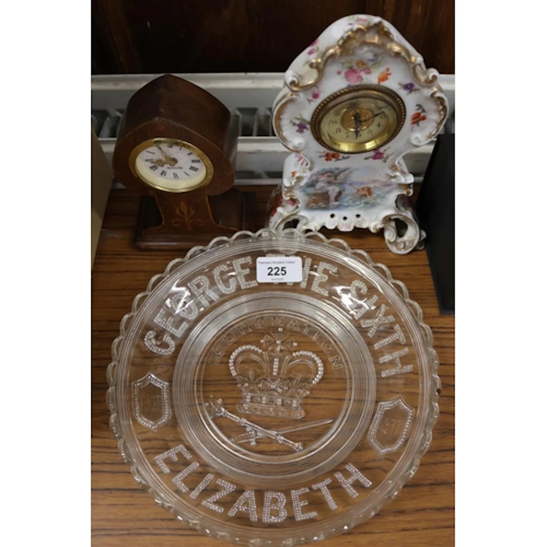 Clocks to include a ceramic Victoria Austria clock and a woo...