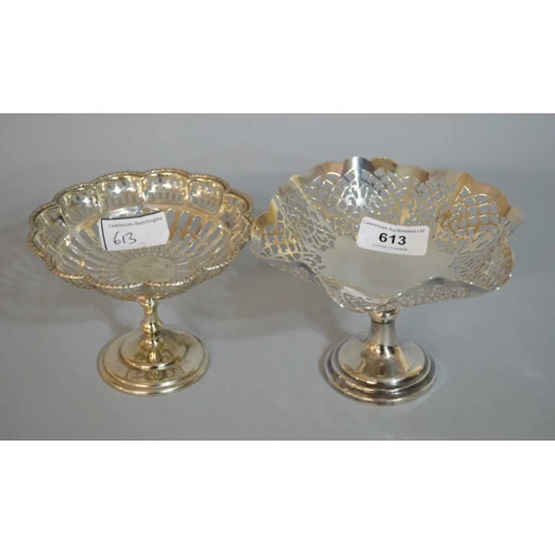 Two 20th Century silver pedestal bonbon dishes, of pierced d...