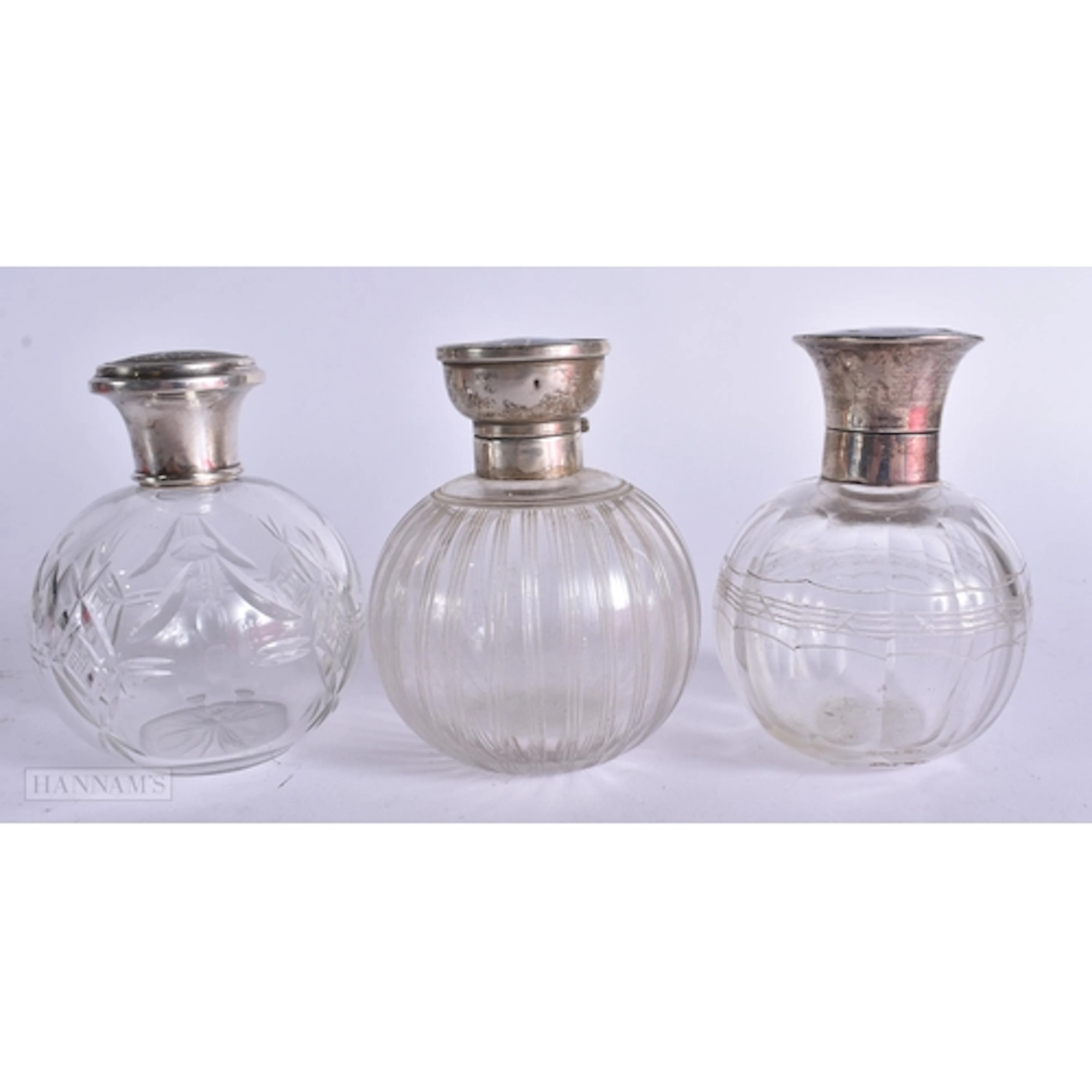 THREE ANTIQUE SILVER AND TORTOISESHELL SCENT BOTTLES. 11.5 c...