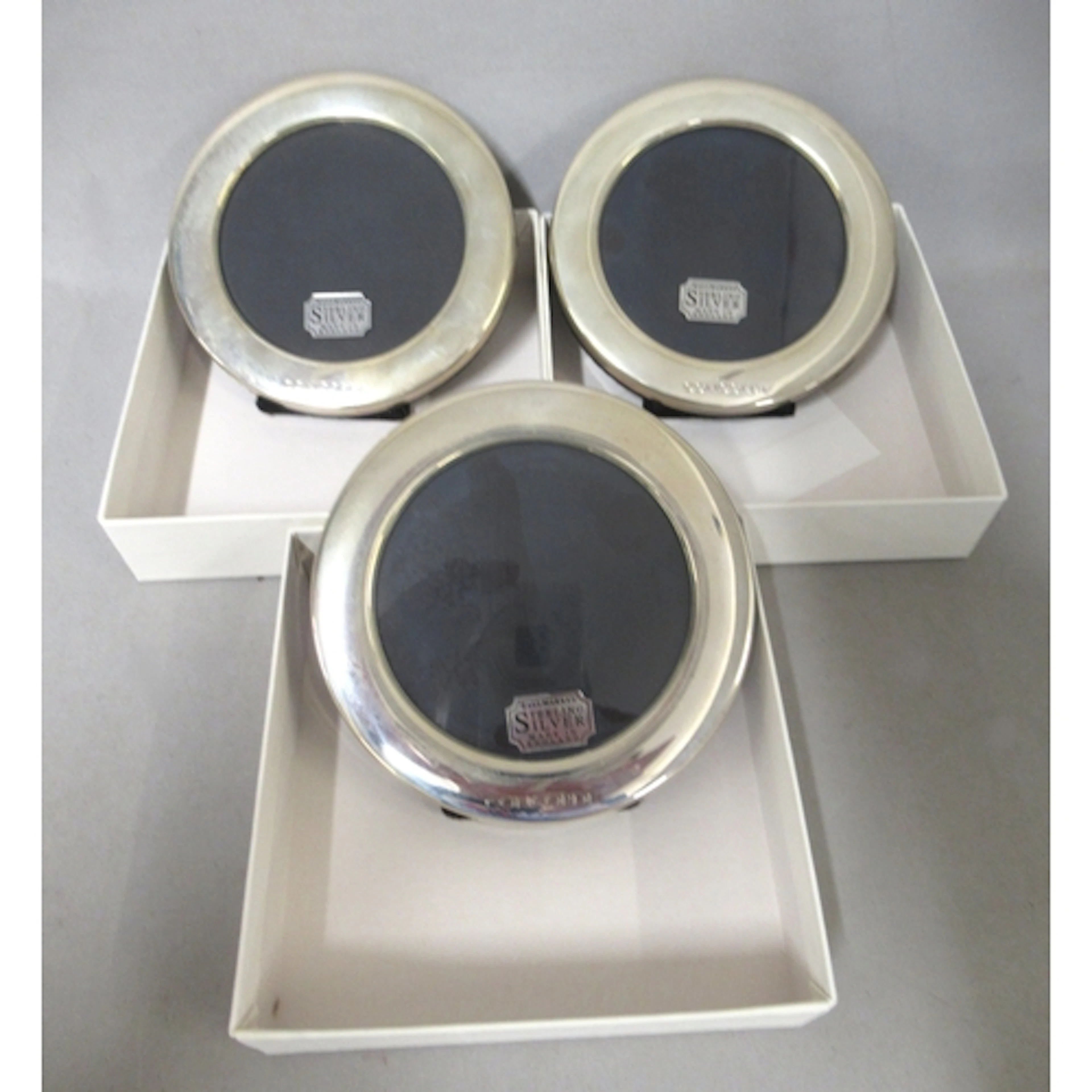 Three Concorde souvenir silver frames in original boxes