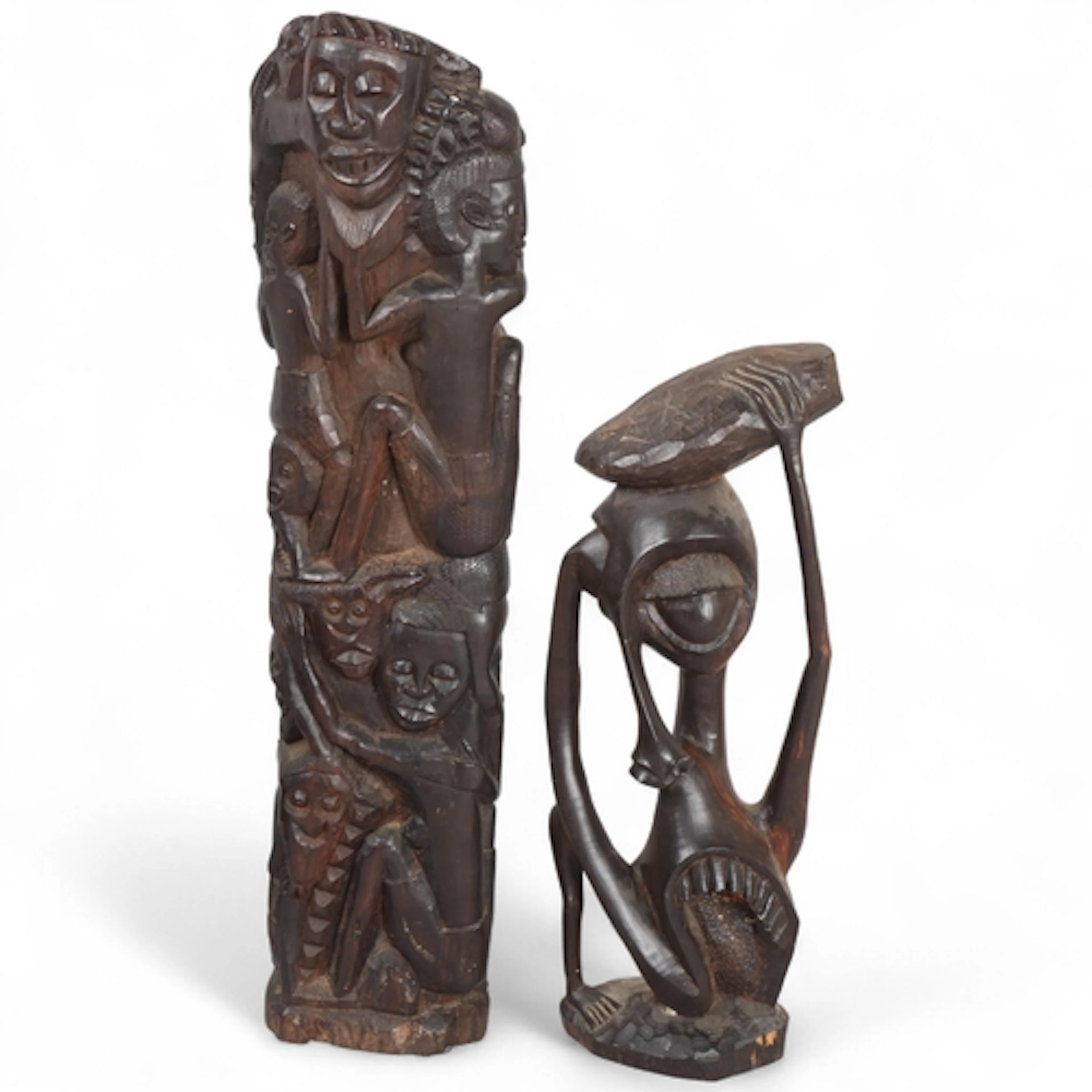 An African relief carved hardwood totem sculpture, height 64...
