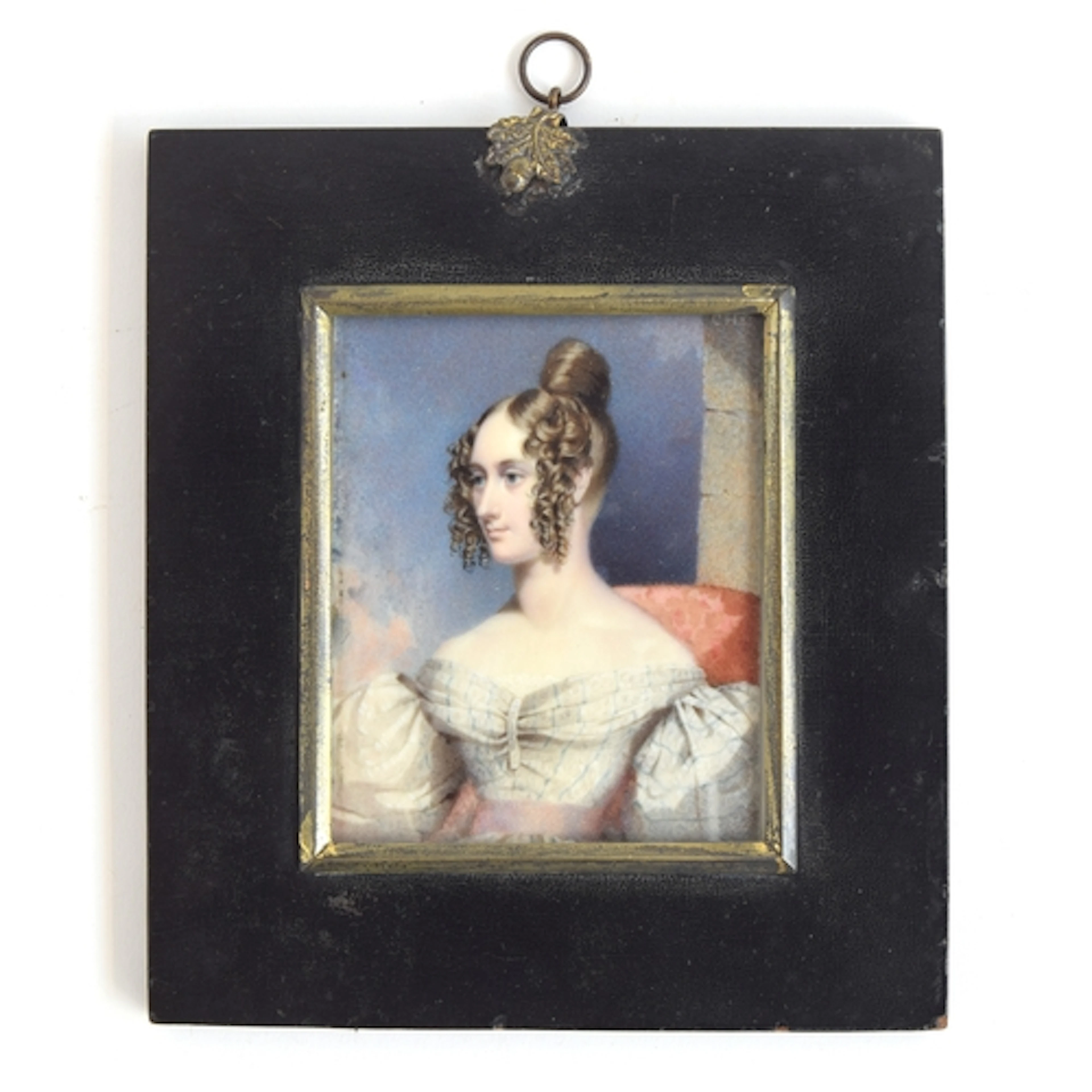 A Regency portrait miniature of a young lady, inscribed to v...