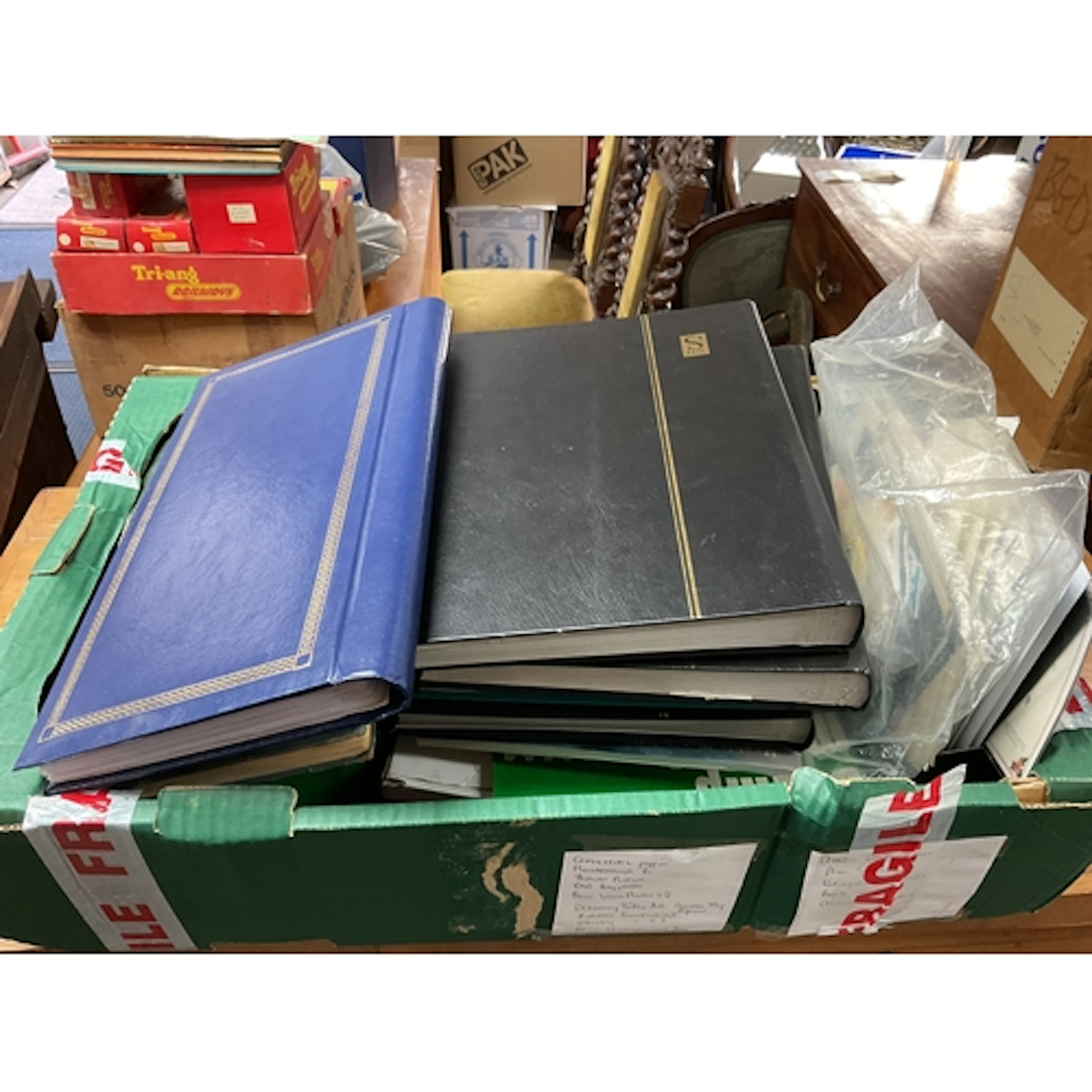 Box of mixed world stamps, albums, stock albums, packets etc...
