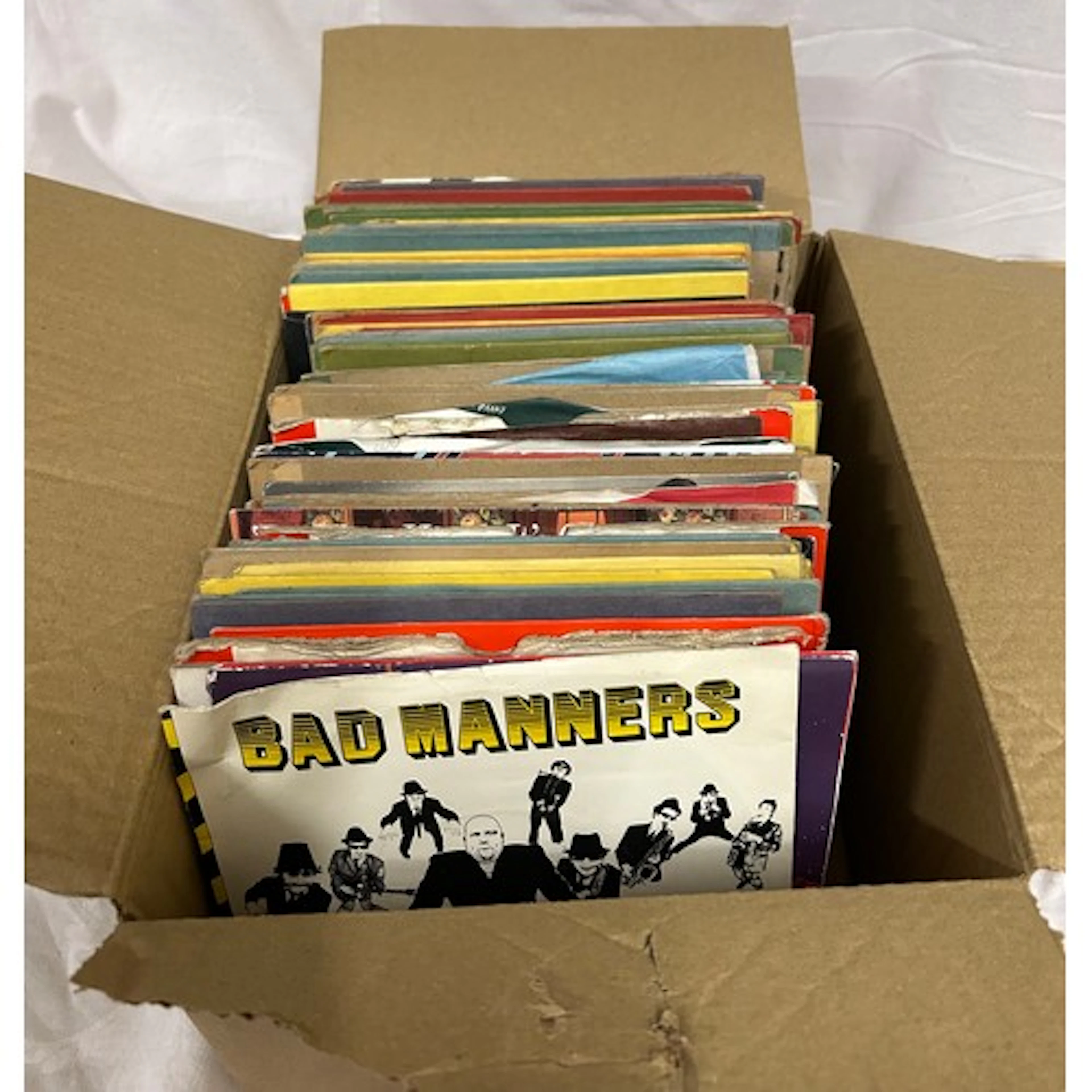 A collection of approx. 100 x 7" singles to include rock, po...