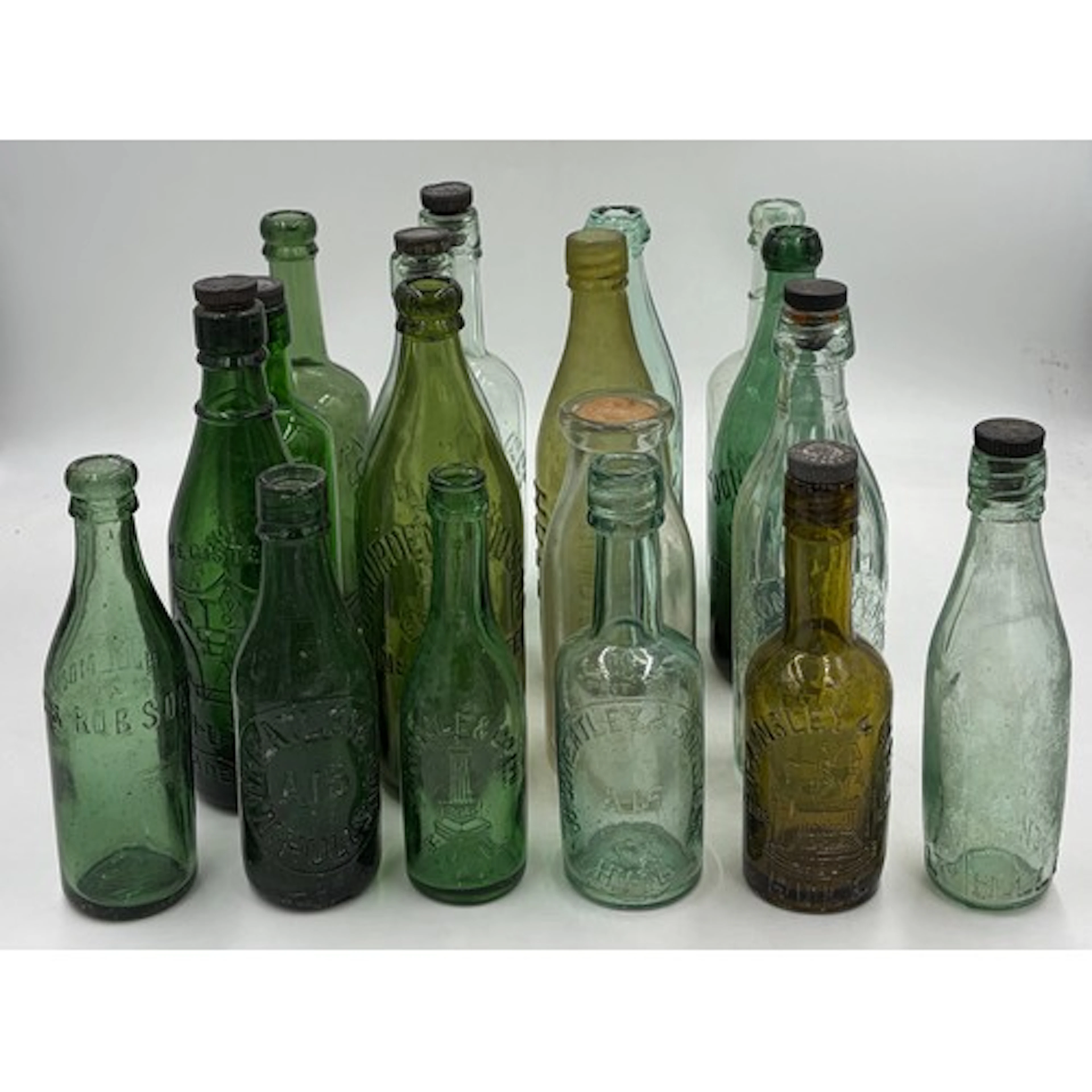 A collection of Hull interest glass beer bottles from Hull m...