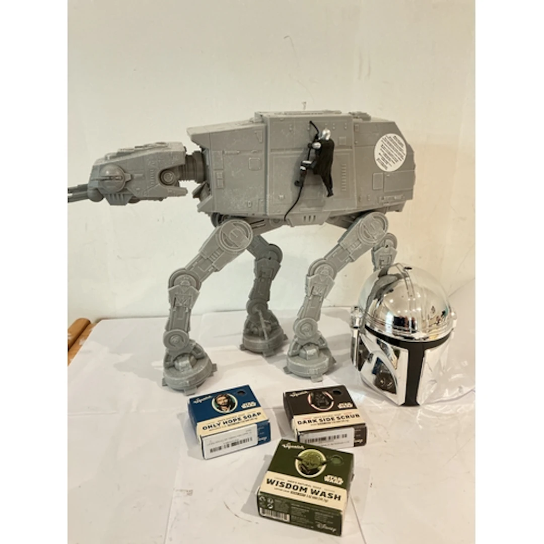 A Collection Of Star Wars Merchandise And Loose Lego.