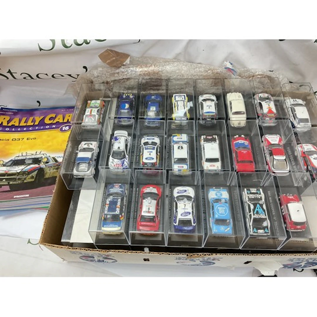 A Collection Of The DeAgostini Rally Car Collection With Bin...