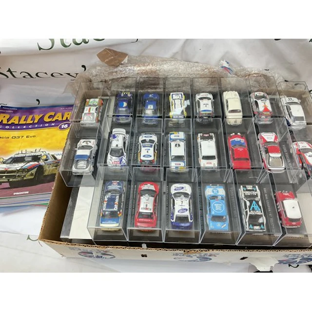 A Collection Of The DeAgostini Rally Car Collection With Bin...