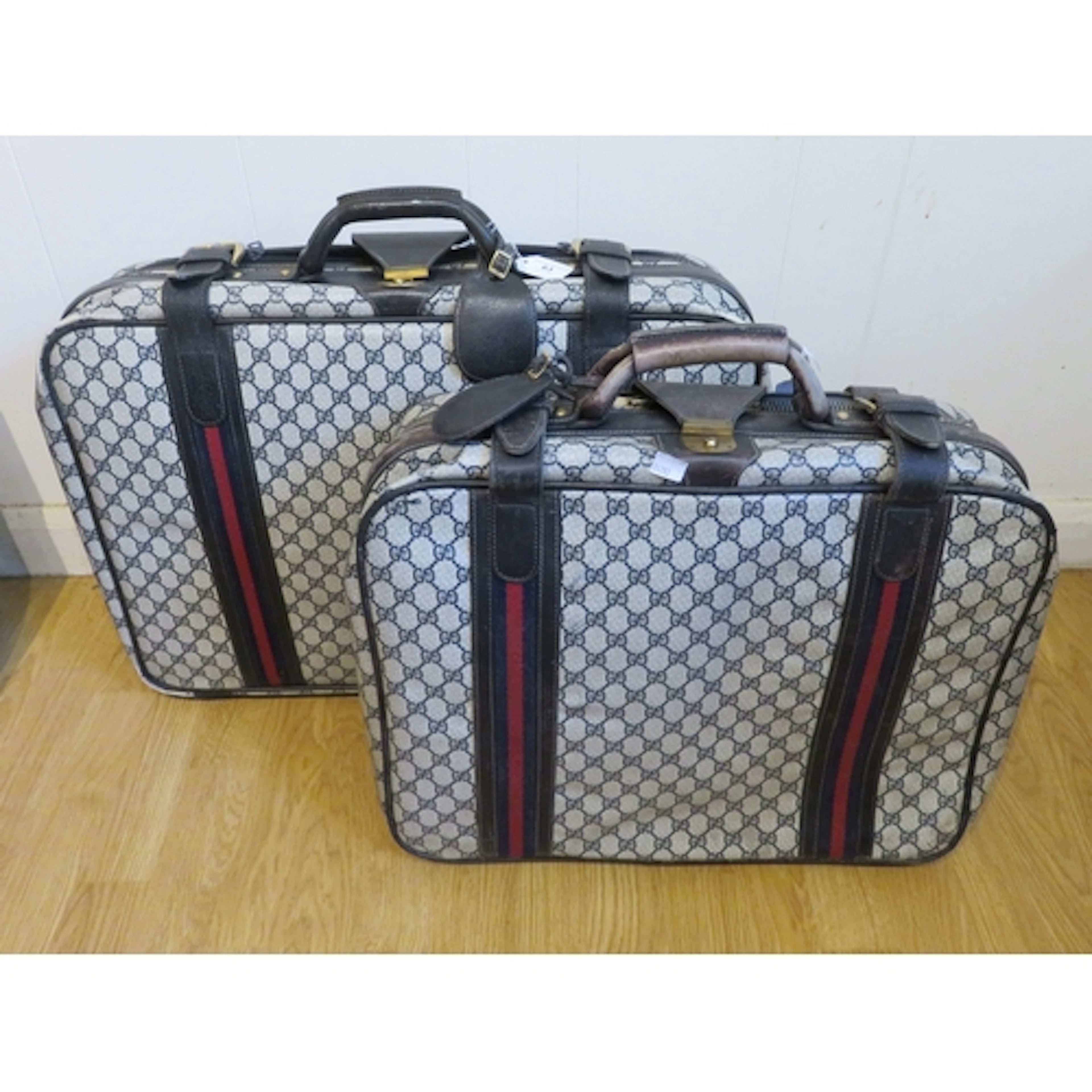 20th Century Gucci suitcase, together with another matching,...