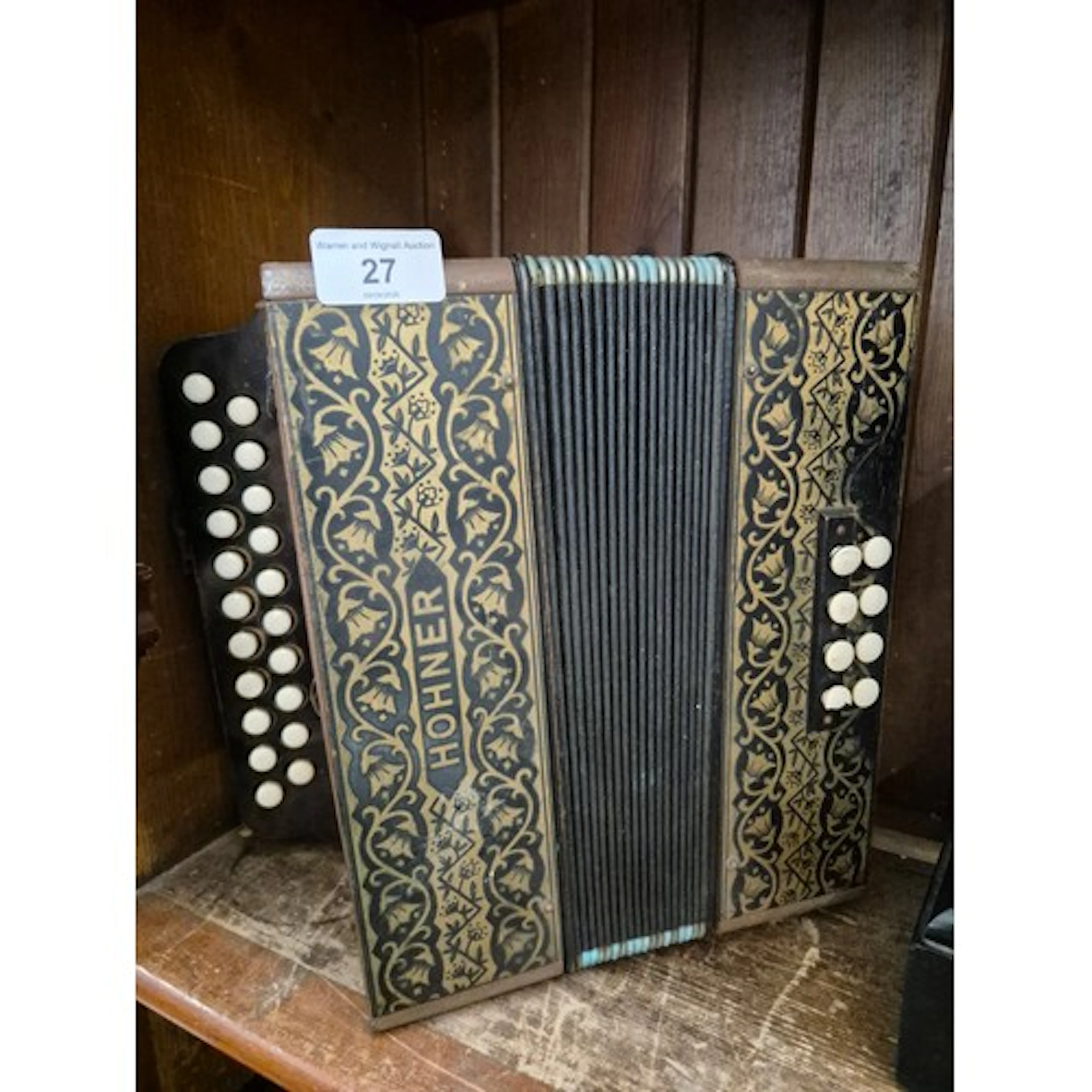 A vintage Hohner Pokerwork diatonic button accordion