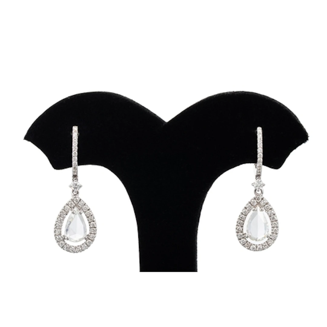 A PAIR OF ROSE CUT DIAMOND DROP CLUSTER EARRINGS, the princi...
