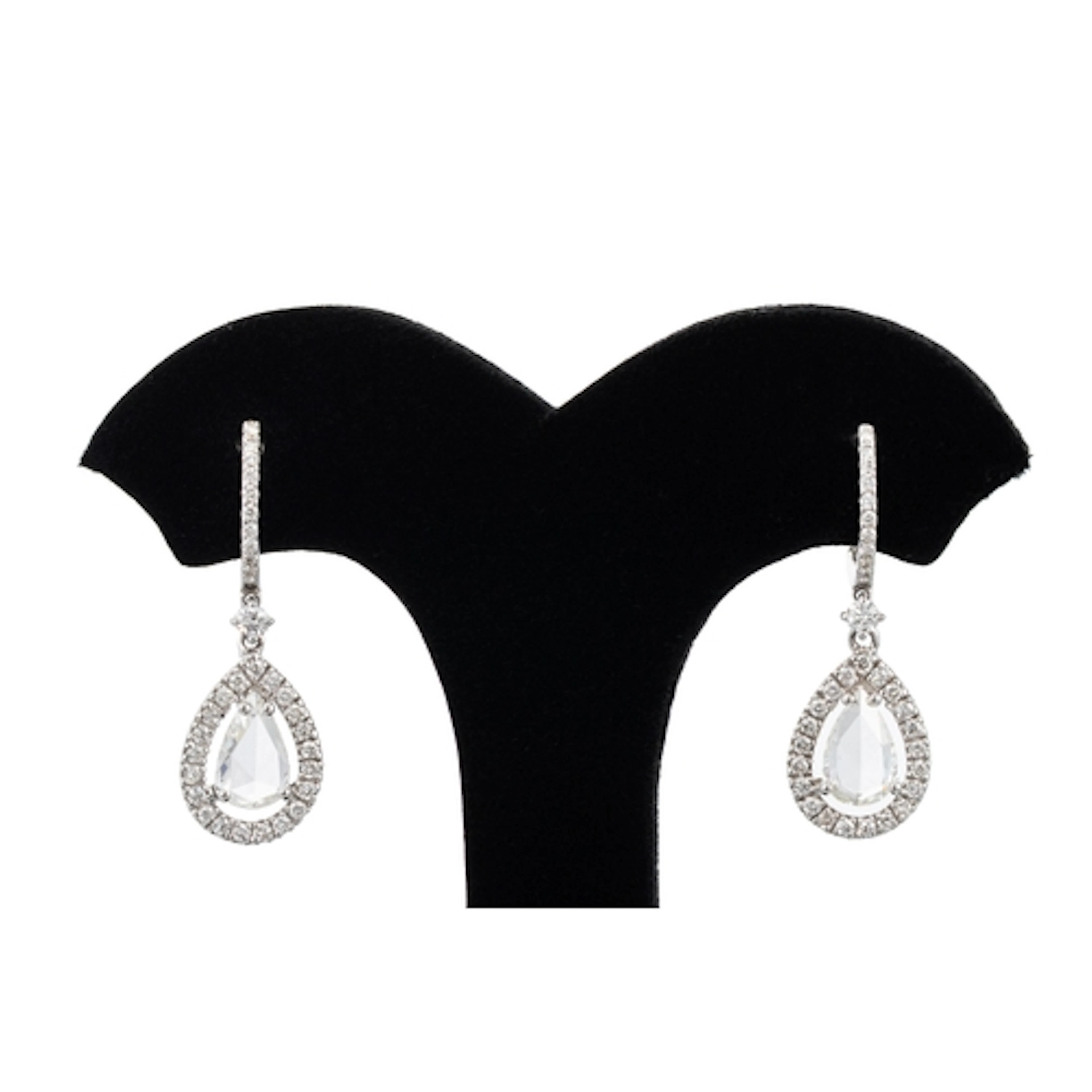 A PAIR OF ROSE CUT DIAMOND DROP CLUSTER EARRINGS, the princi...