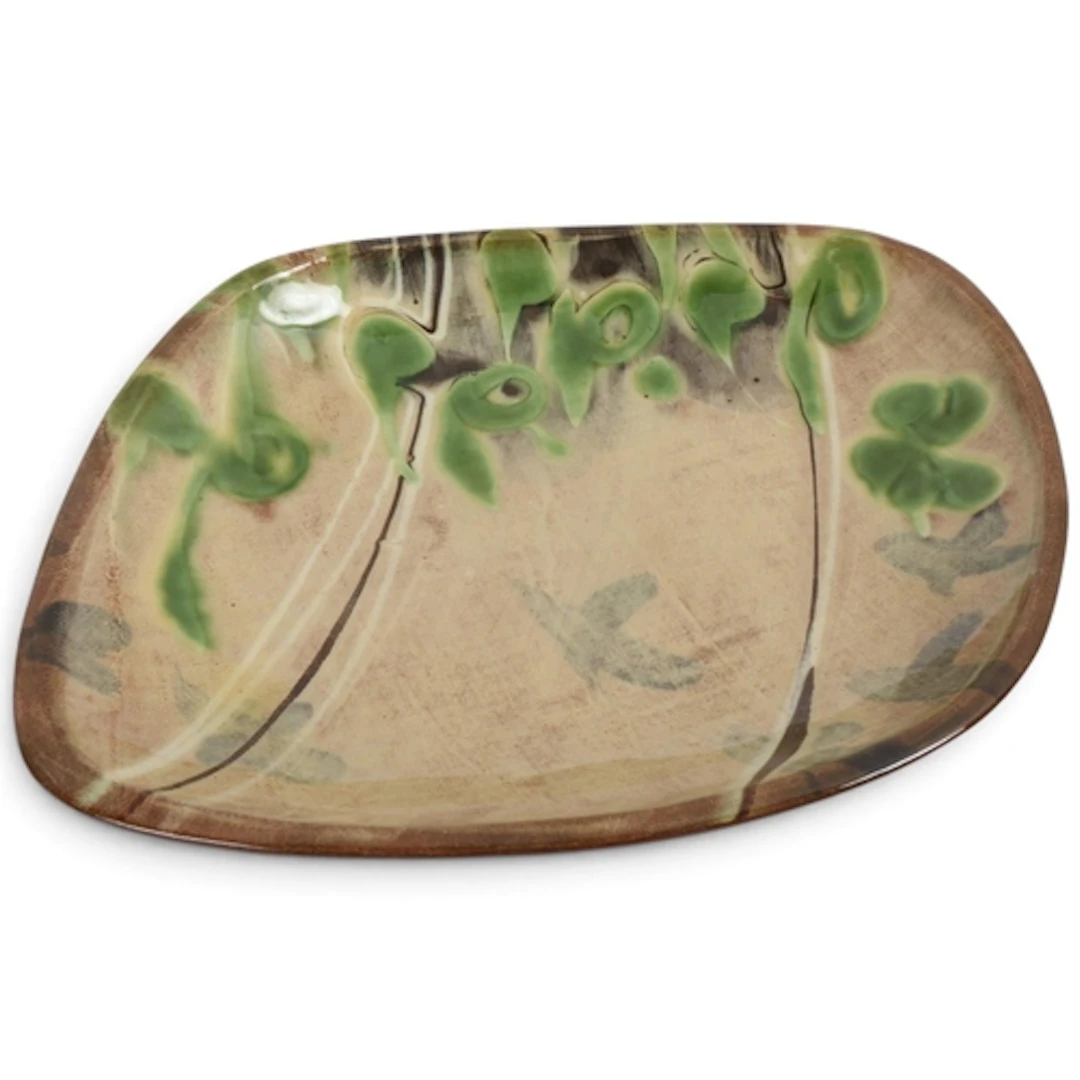 PATIA DAVIS (born 1967) an eathenware slipware slab plate wi...