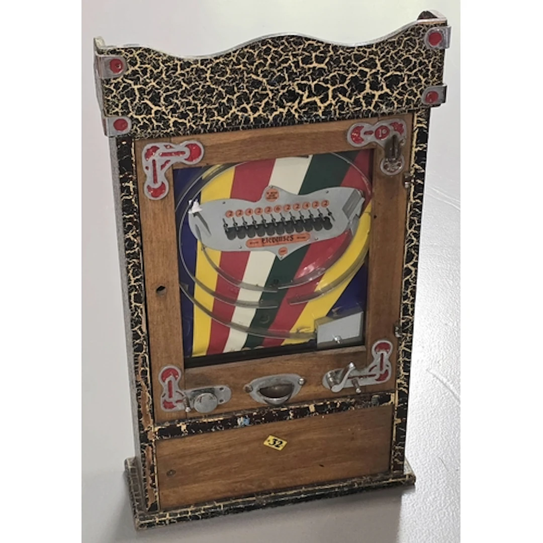 A vintage 1950's Bryans Elevenses oak and glazed penny slot ...