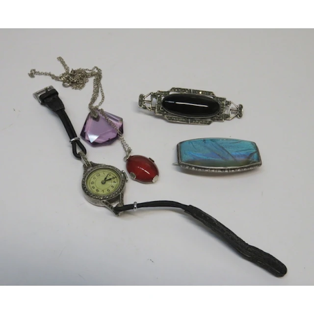 Silver butterfly wing brooch, silver pendant, watch, and oth...