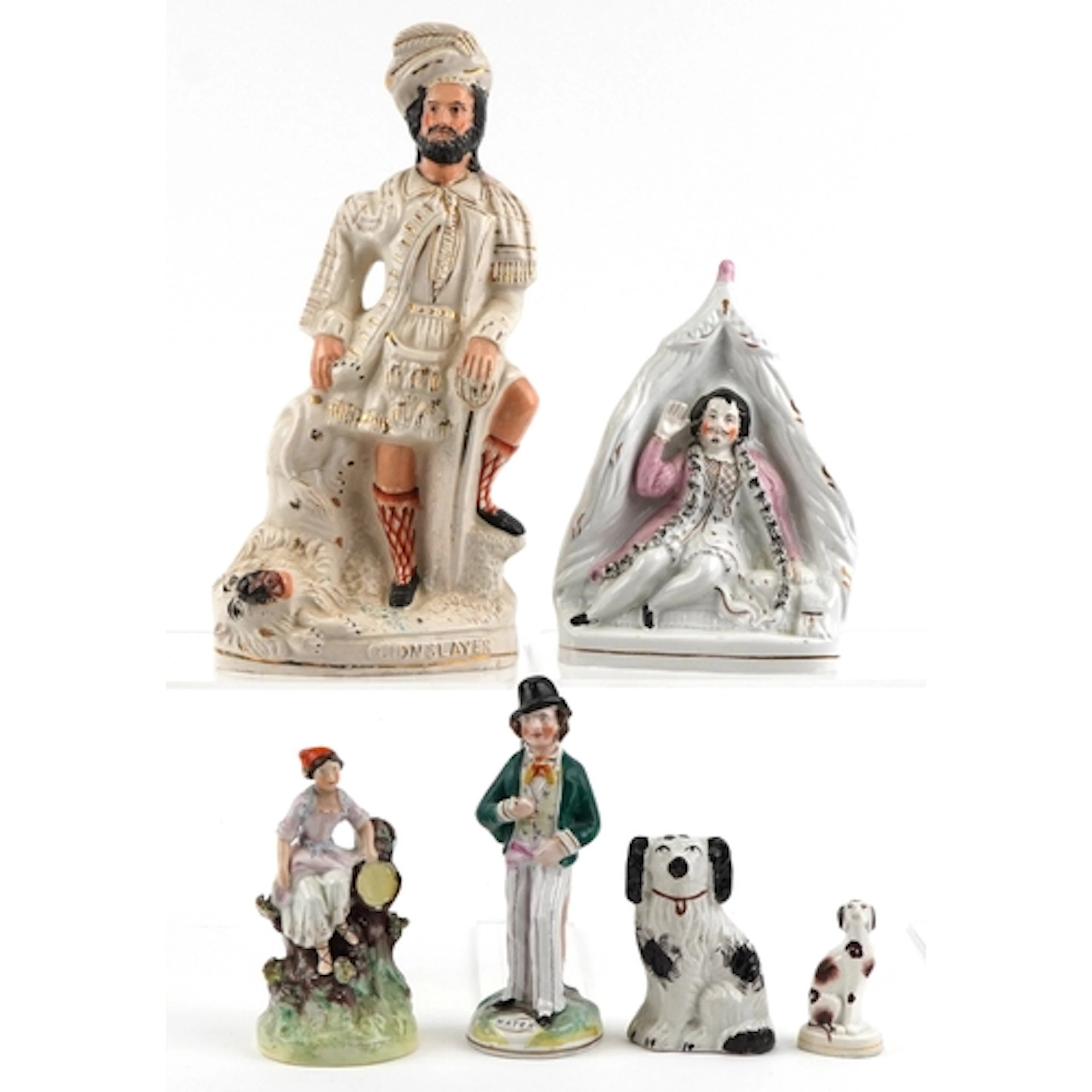 Six Victorian Staffordshire pottery figures including a flat...