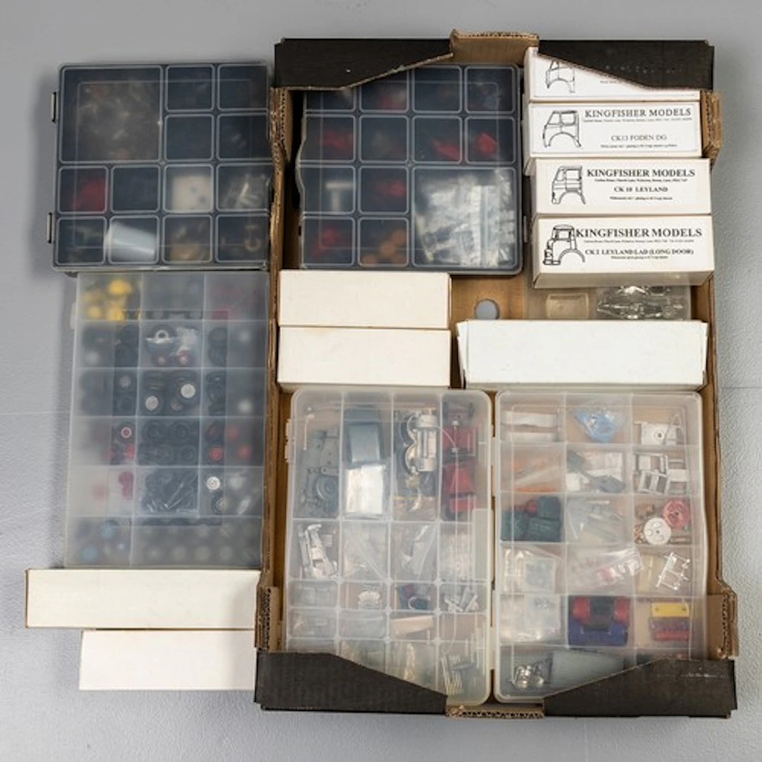 Fruit tray containing Dinky/Corgi spares for restoration wor...