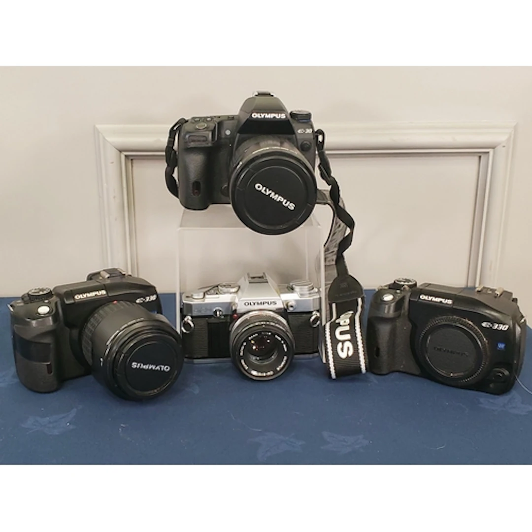 An Olympus OM-30 silver with 50mm f1.8 Zuiko, shutter stuck ...