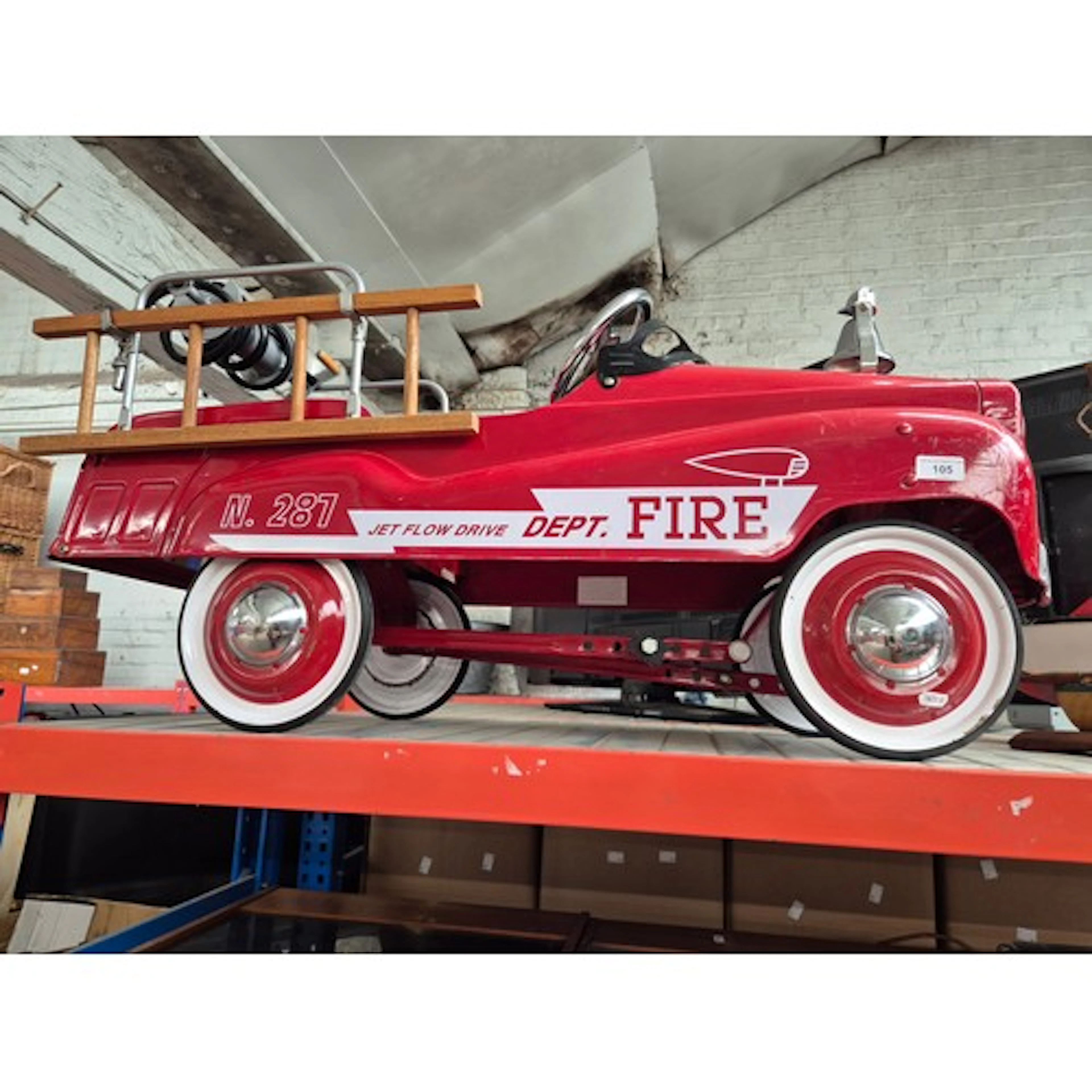 An American Burns Novelty & Toy Co. fire engine.