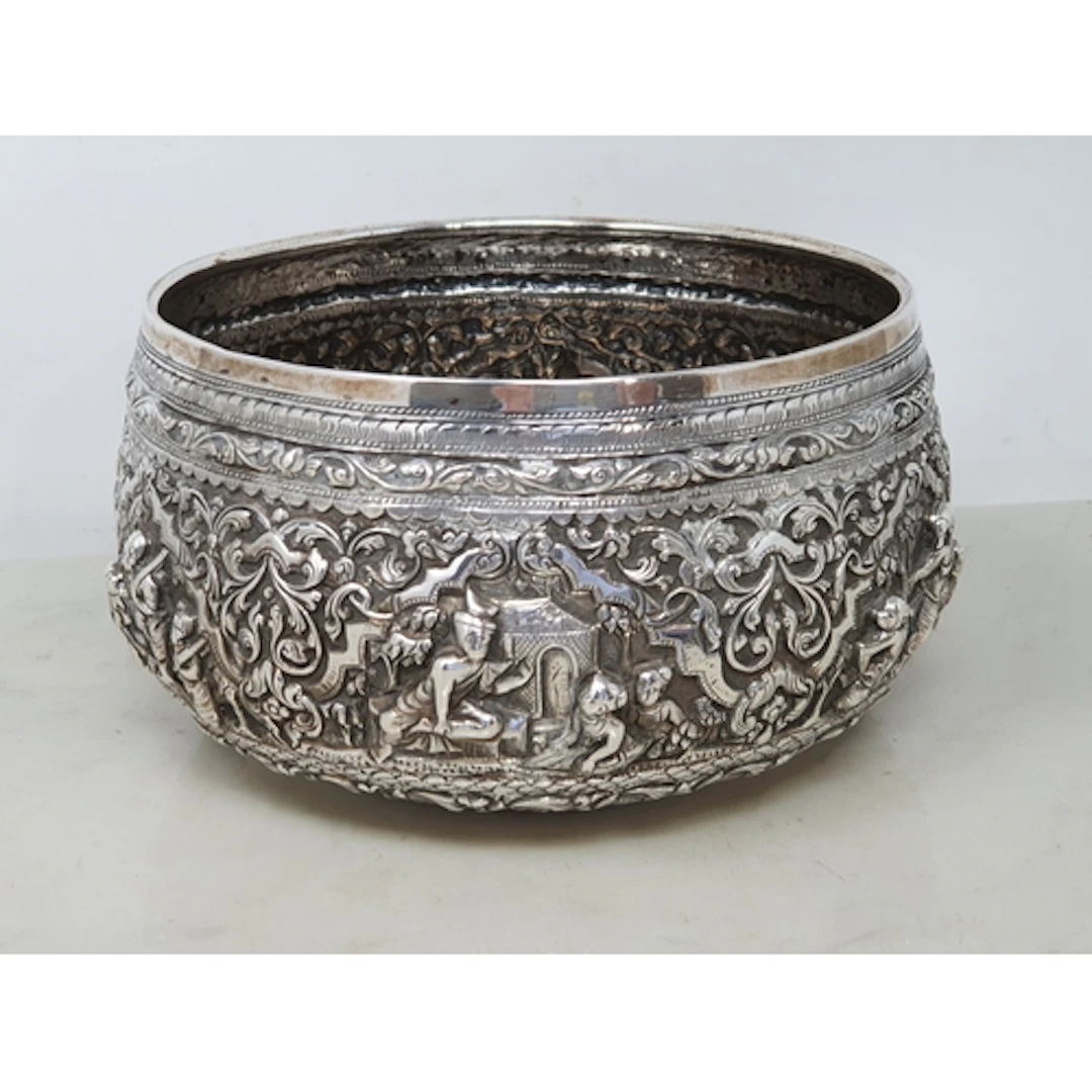 An Indian silver circular Bowl embossed and chased with frie...