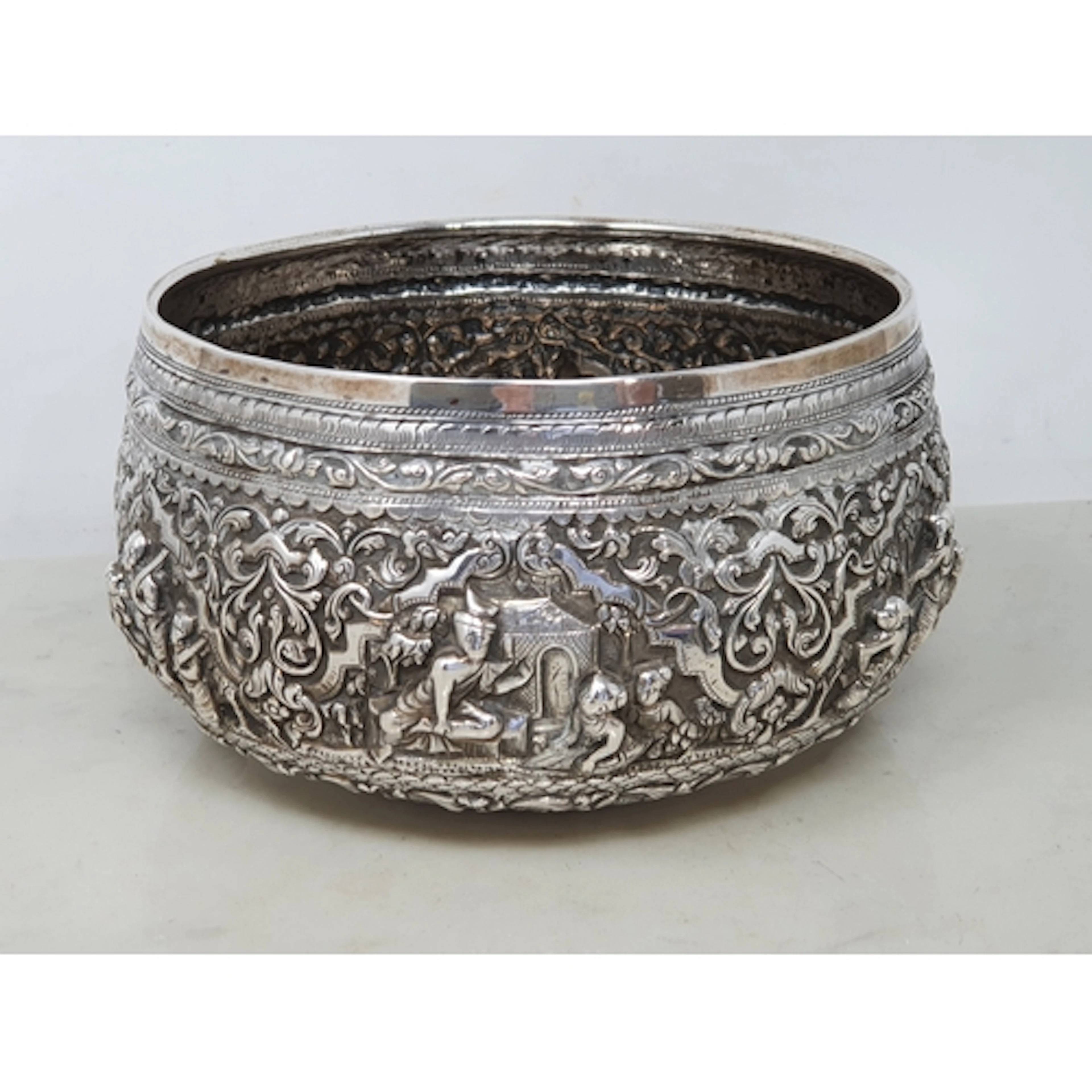 An Indian silver circular Bowl embossed and chased with frie...