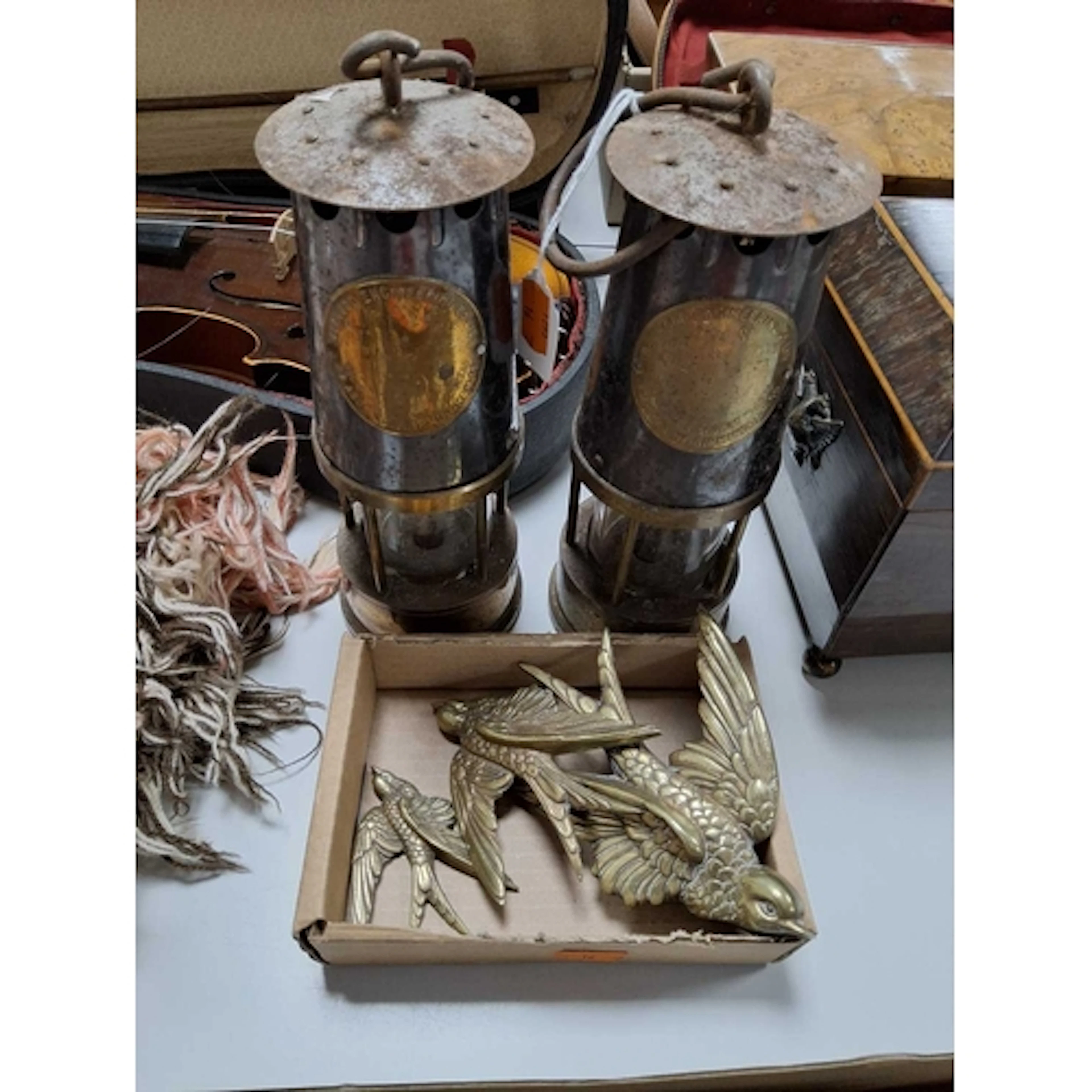 A GROUP OF TWO VINTAGE MINER'S LAMPS AND THREE VINTAGE WALL ...