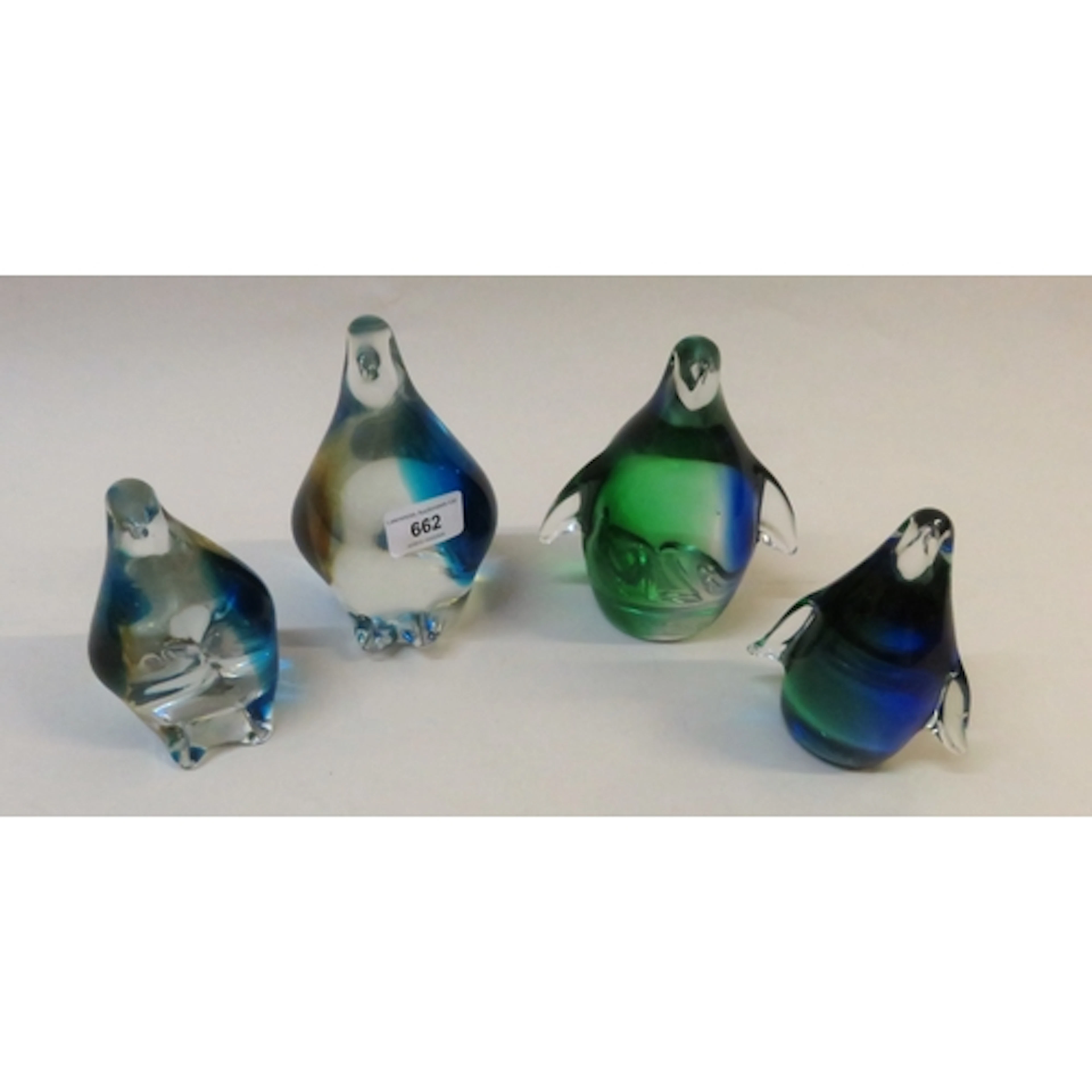 Four Murano type glass figures of penguins