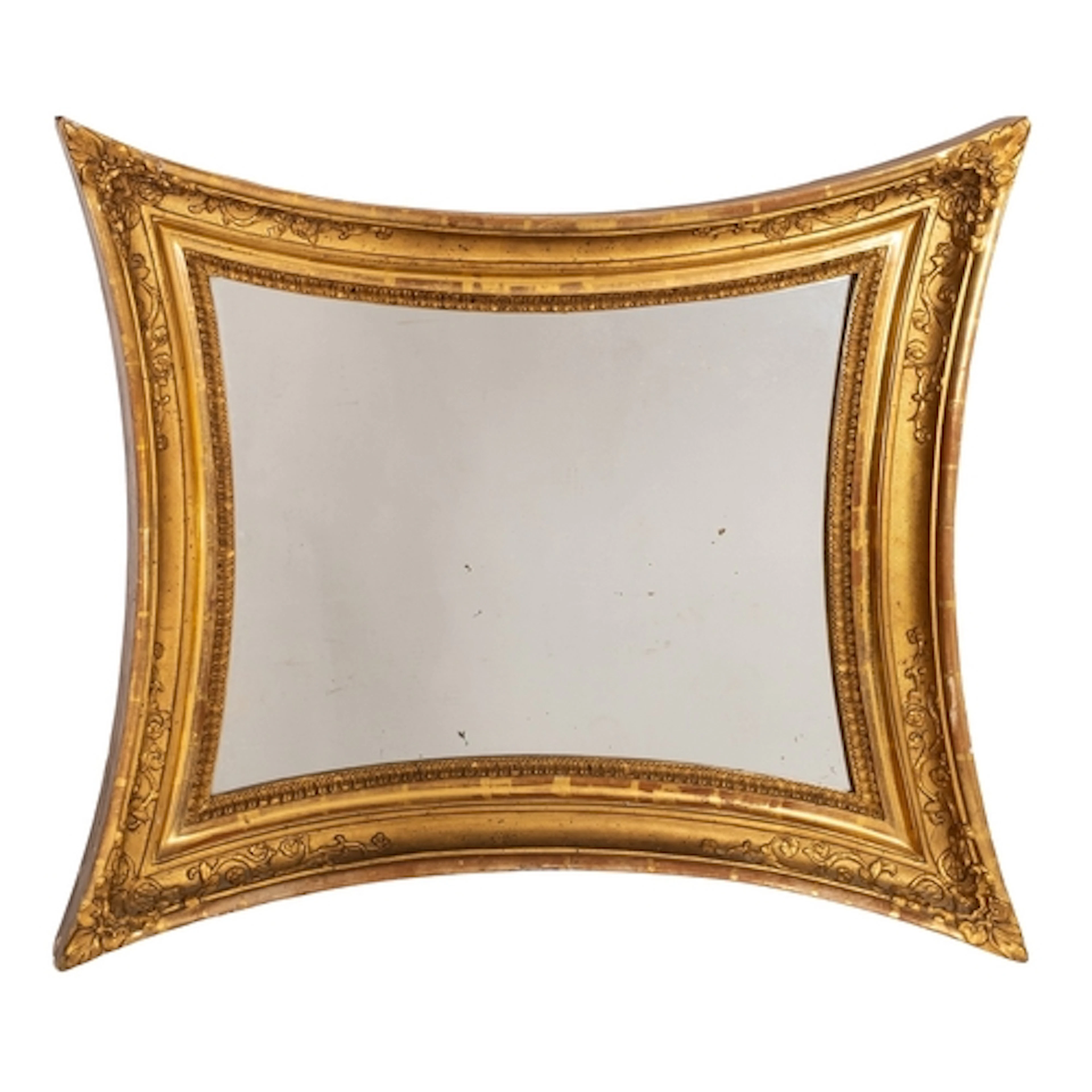 A giltwood and composition framed wall mirror in early 19th ...
