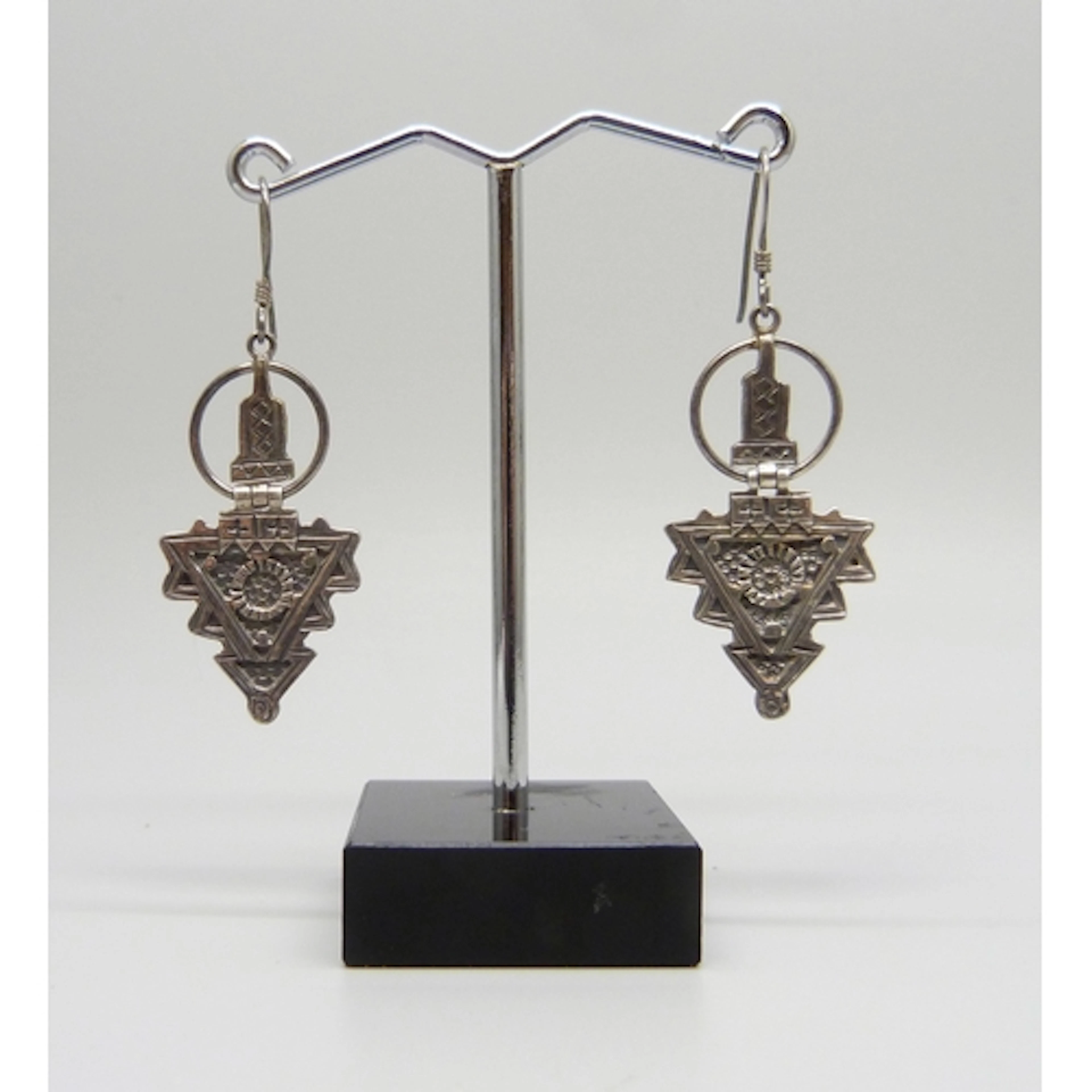 A pair of Aztec style silver drop earrings, 4.5cm including ...