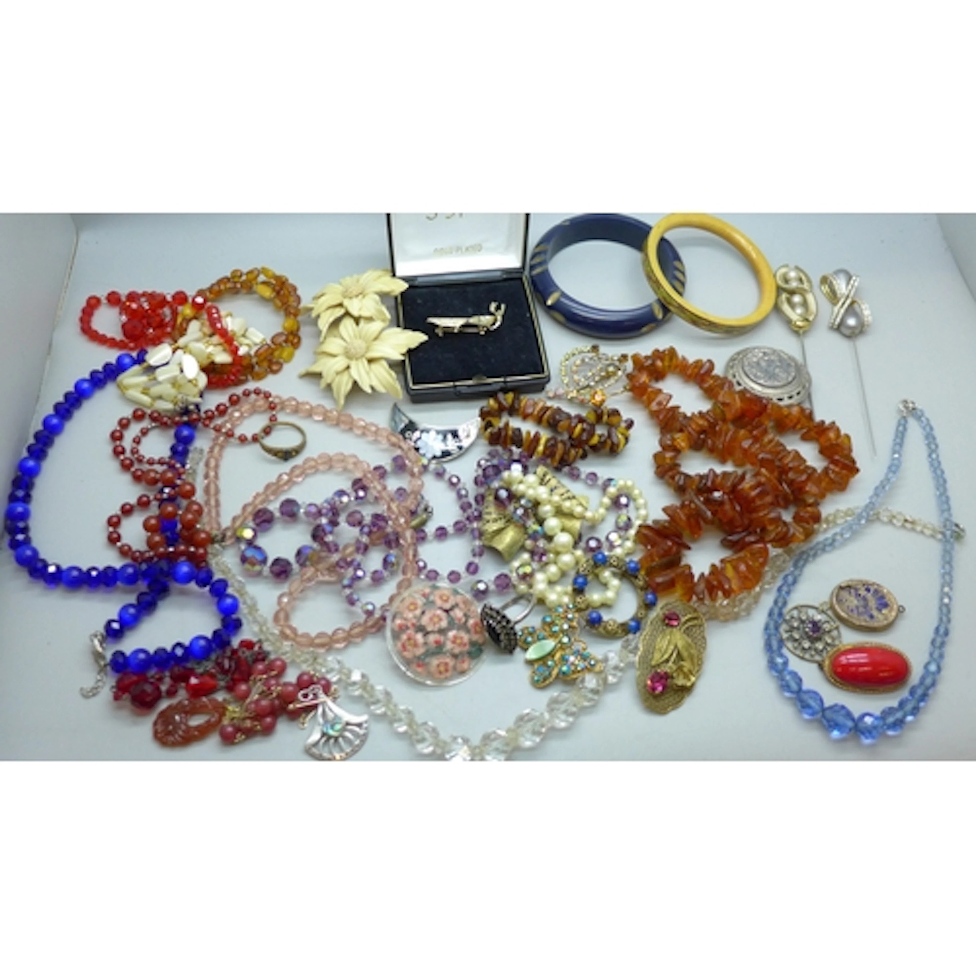 Vintage costume jewellery including amber beads, (enameled l...