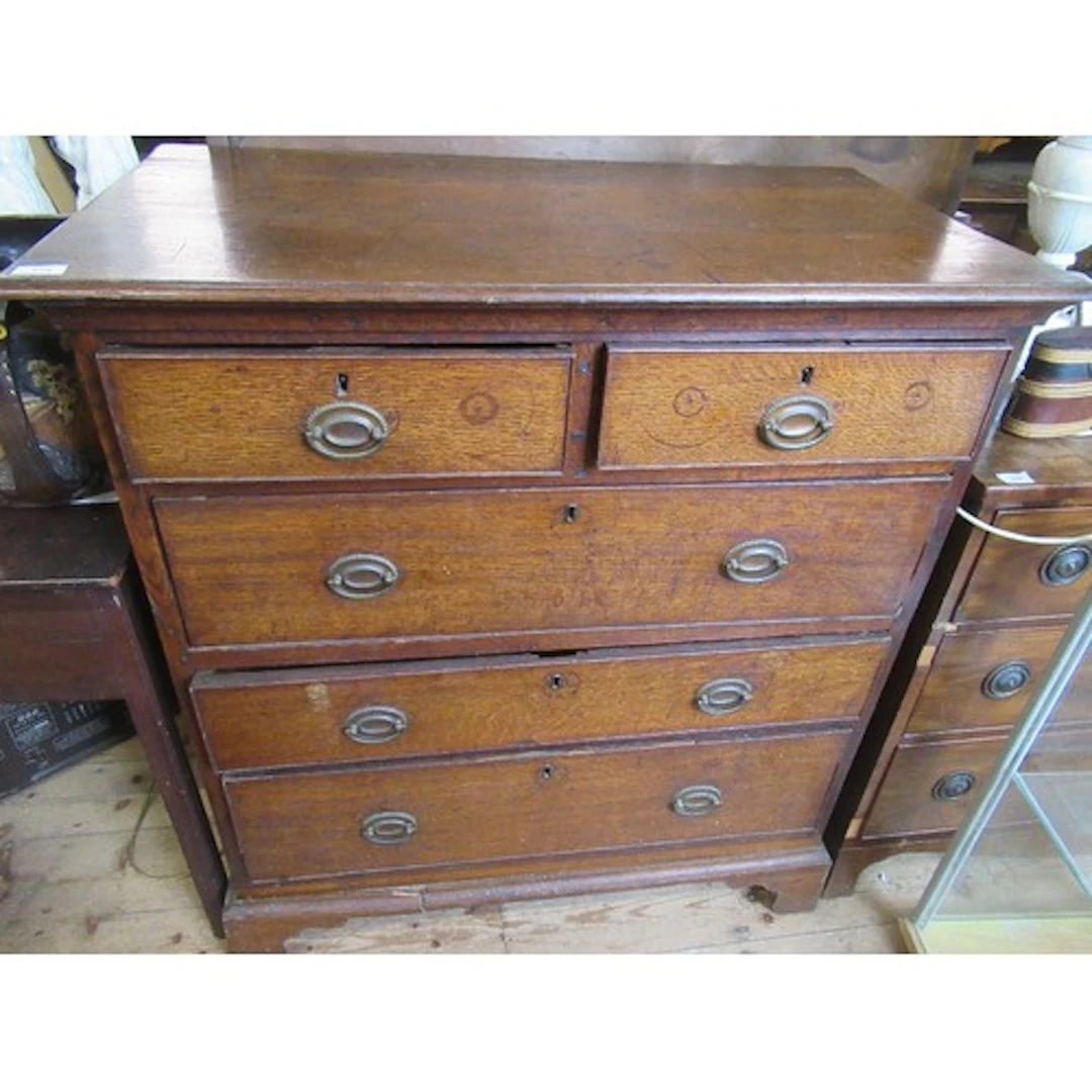 An antique oak chest of drawers width 39ins depth 22ins, hei...