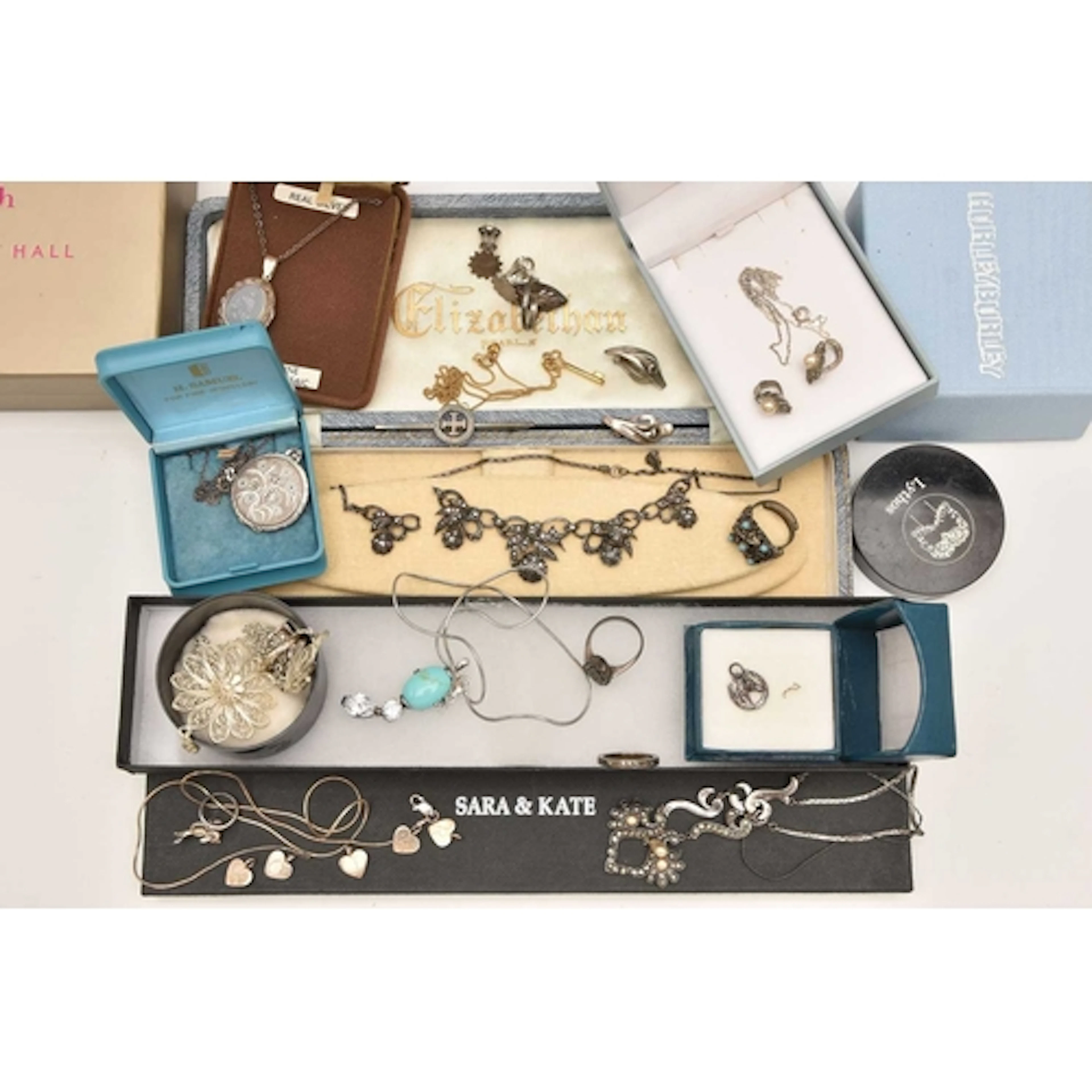 AN ASSORTMENT OF WHITE METAL JEWELLERY, to include pendant n...
