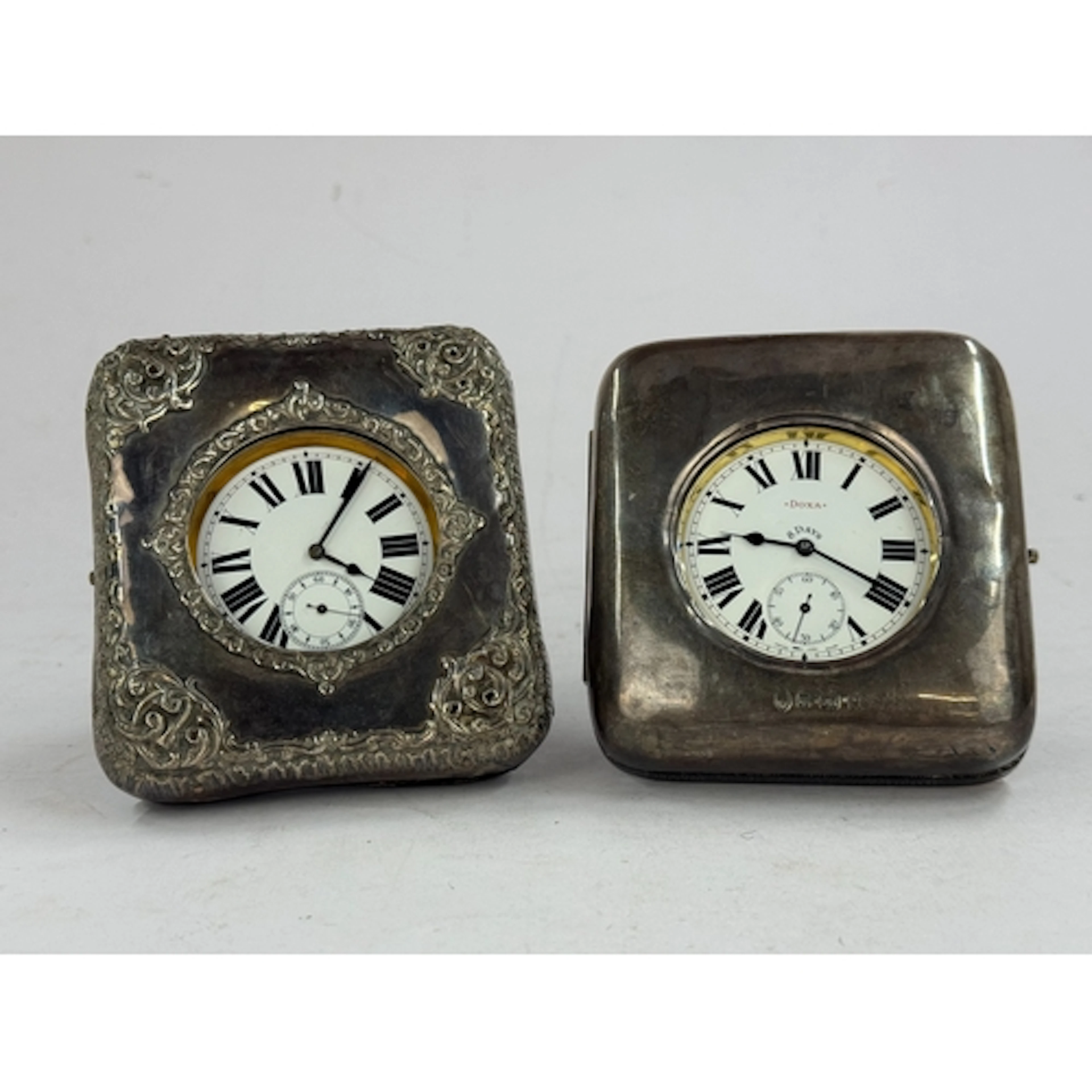 Watches: a nickel cased 6.5cm Goliath pocket watch, 'The Dox...