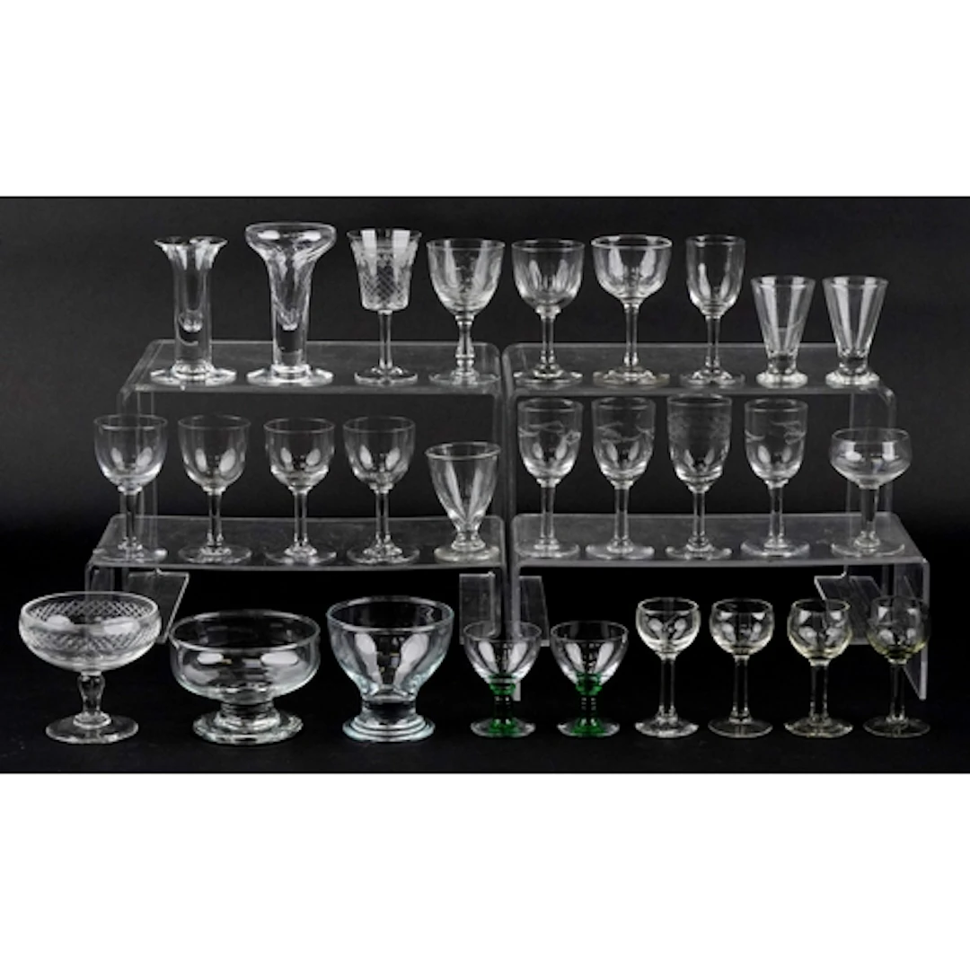 Collection of antique and later drinking glasses, the larges...