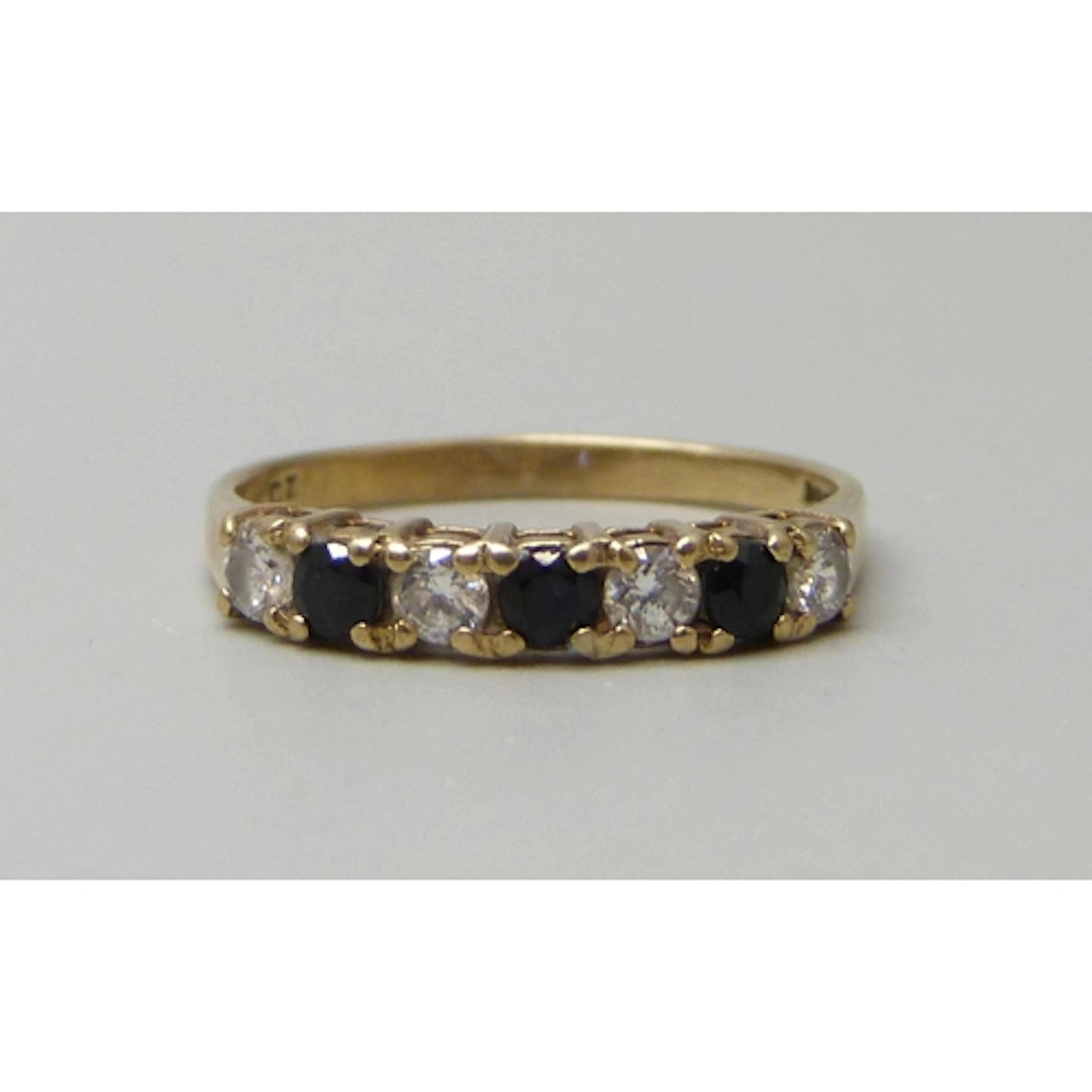 A 9ct gold, sapphire and white stone ring, 1.8g, O/P