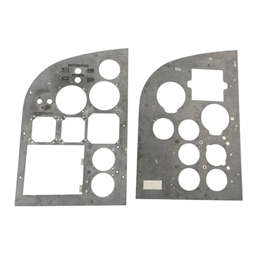 Two aircraft cockpit instrument panels or dashboard frames. ...